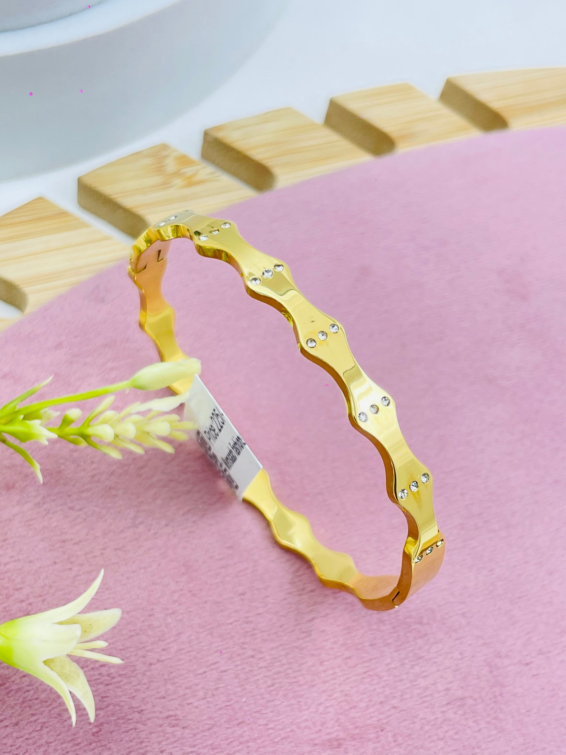 Elegant Gold Bangle with Diamond Accents