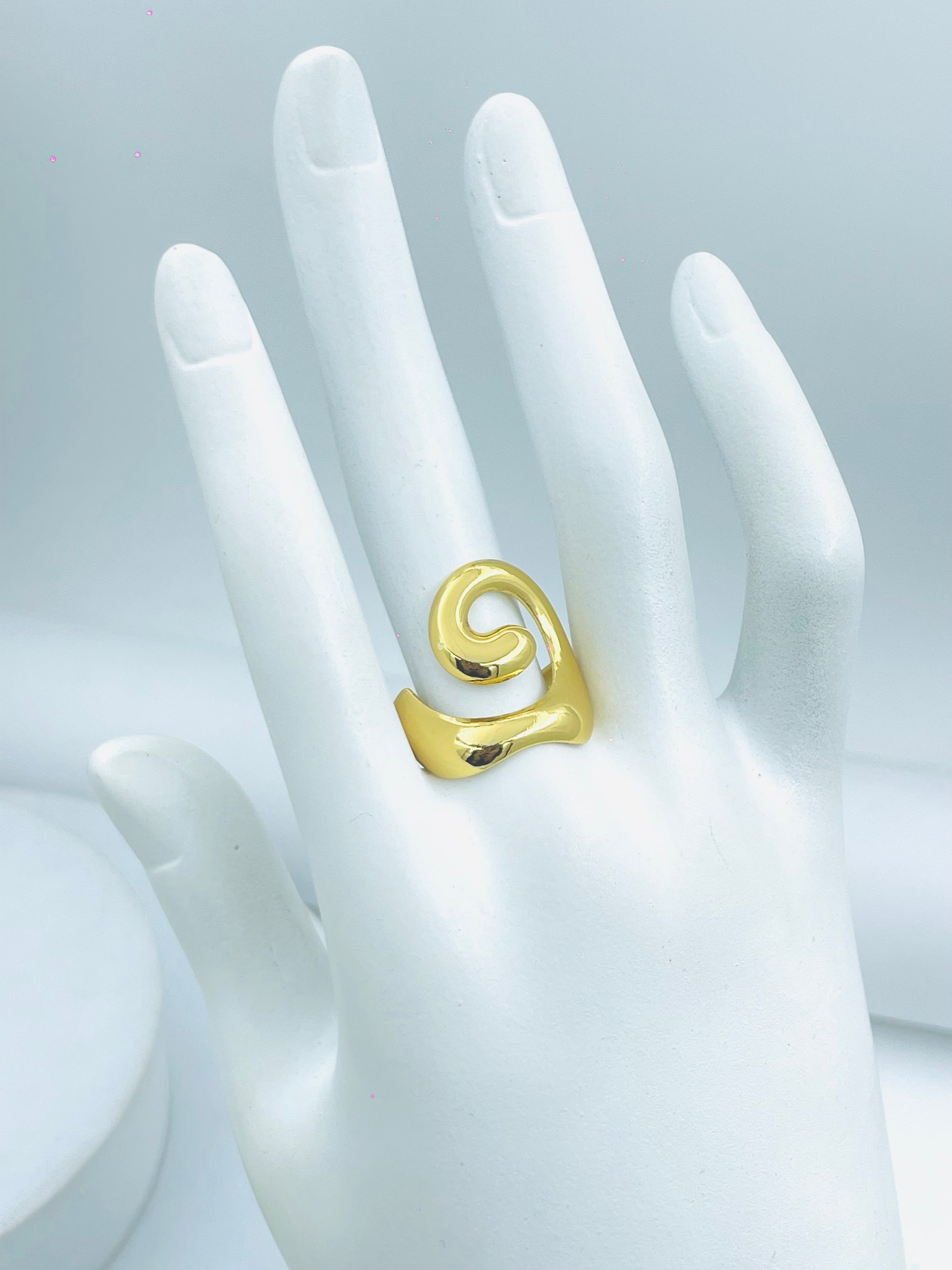 Stylish Gold Spiral Ring for Women  Modern Jewelry Design