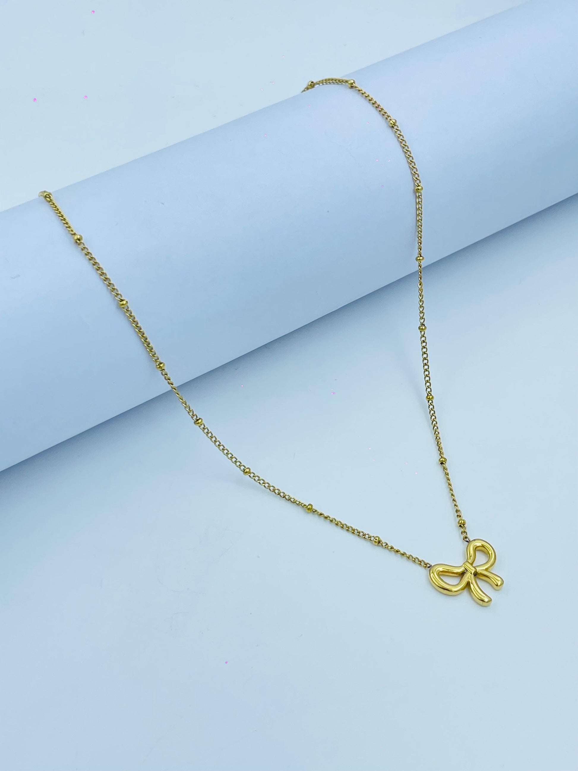 Elegant Gold Bow Pendant Necklace