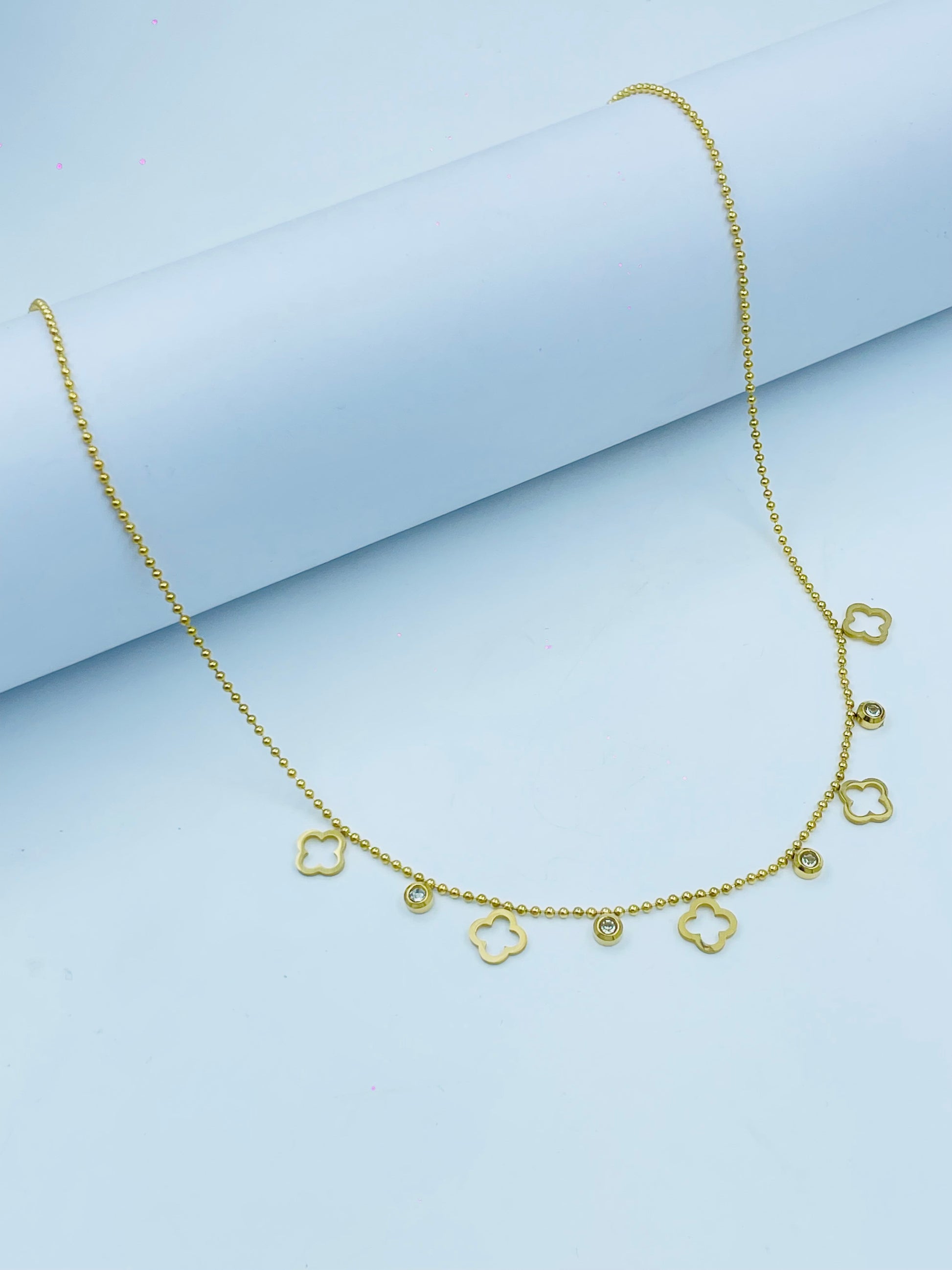 Gold Beaded Necklace with Clover Charms & Stone Accents – Elegant Jewelry