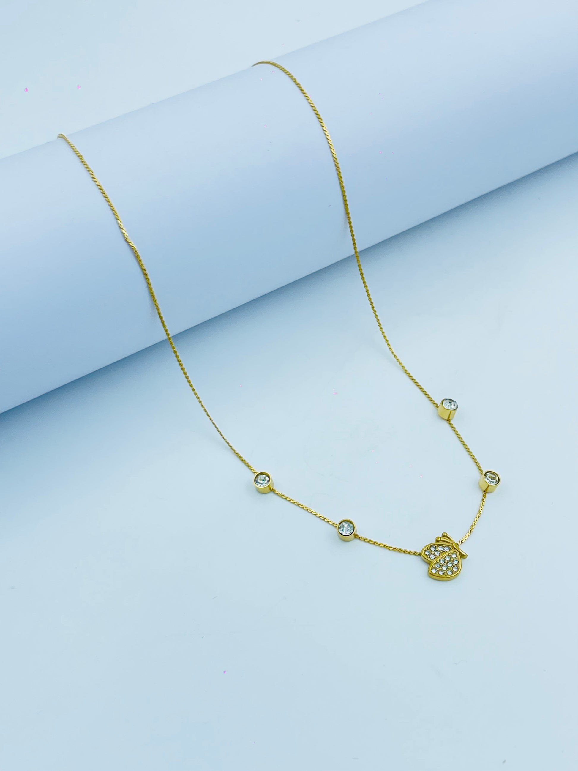 Elegant Gold Pendant Necklace with Diamond Accents