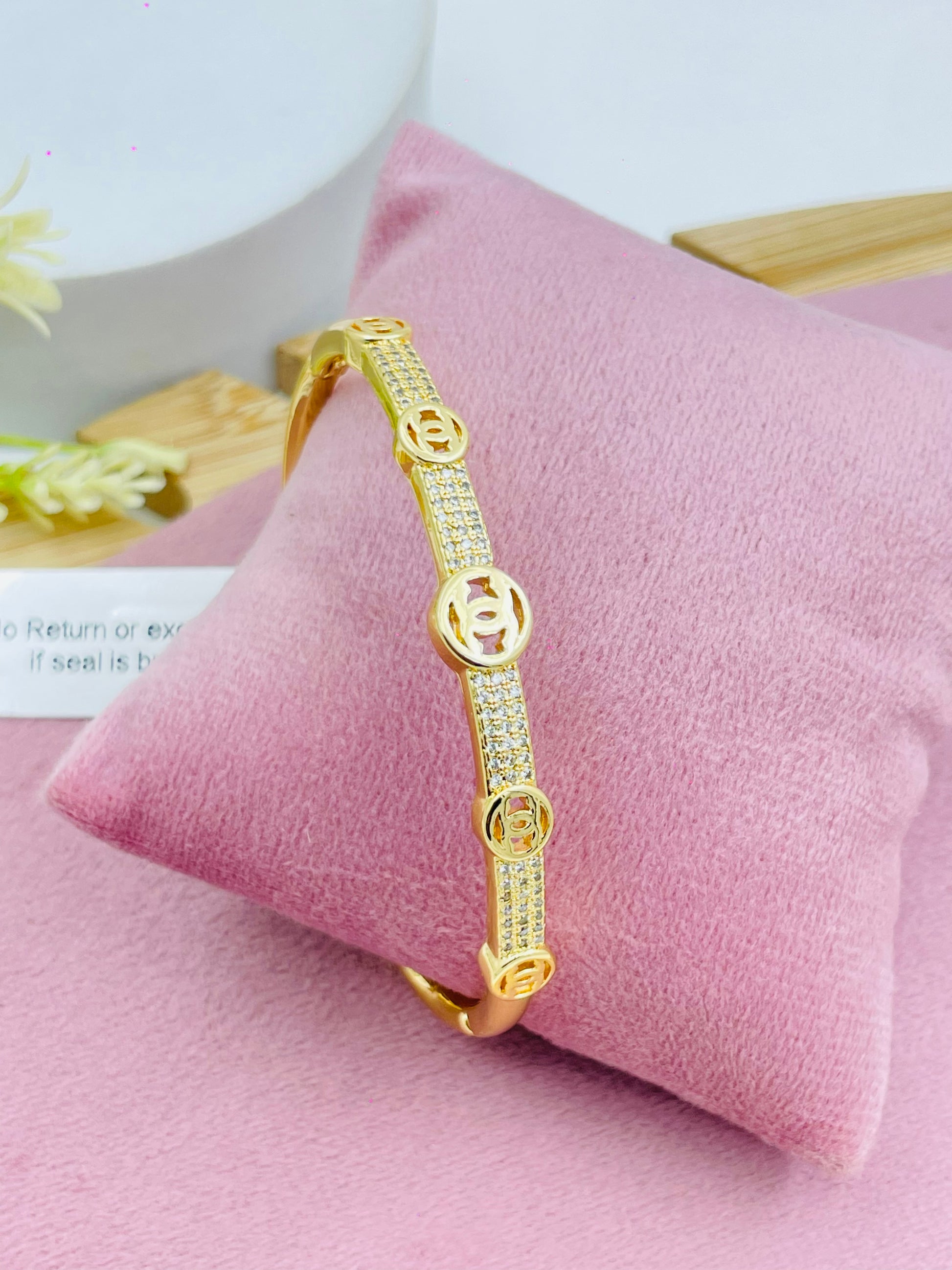 Elegant GoldPlated Designer Bracelet with Crystal Accents