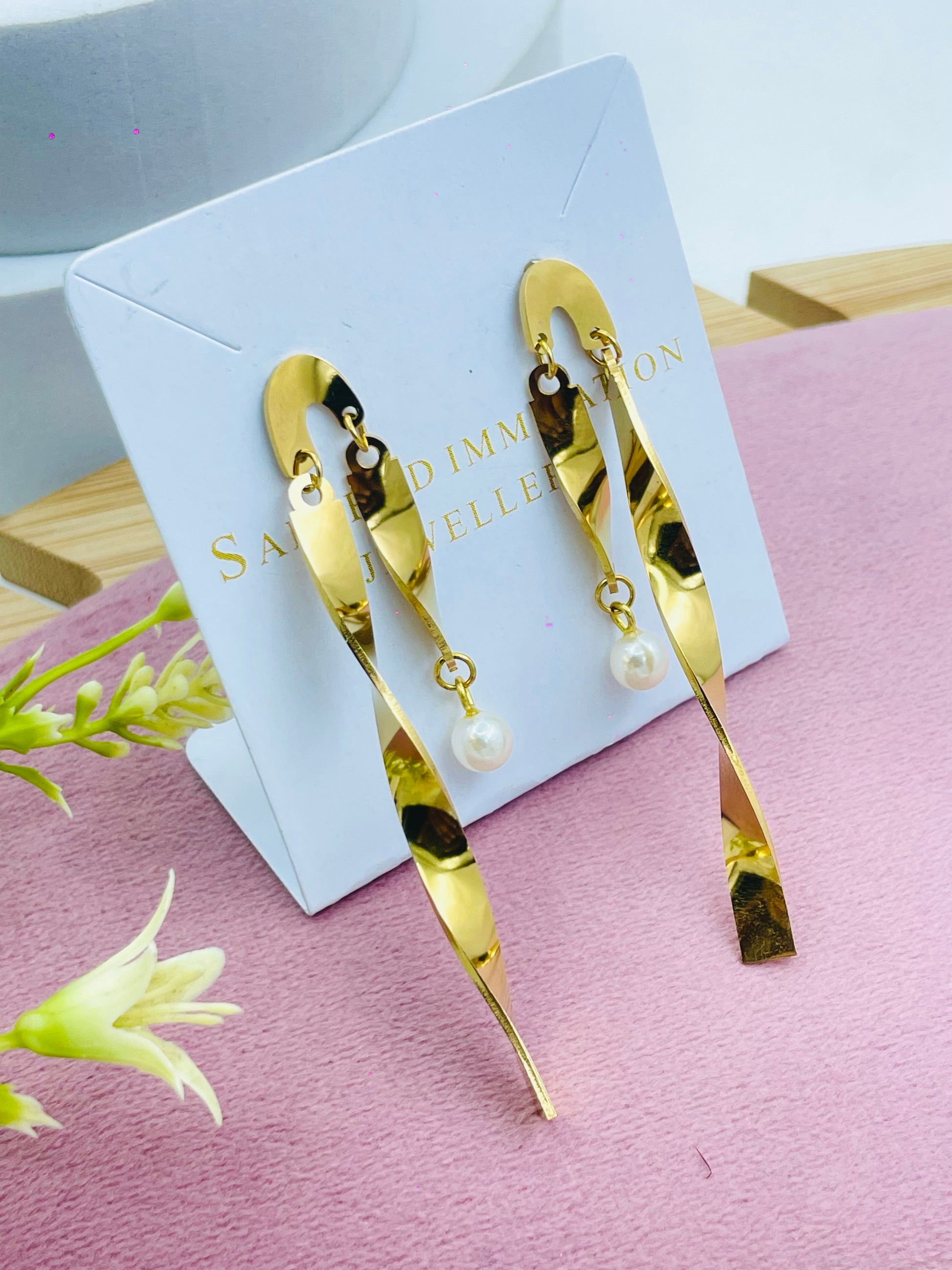 Elegant Gold Twist Earrings with Pearl Drops