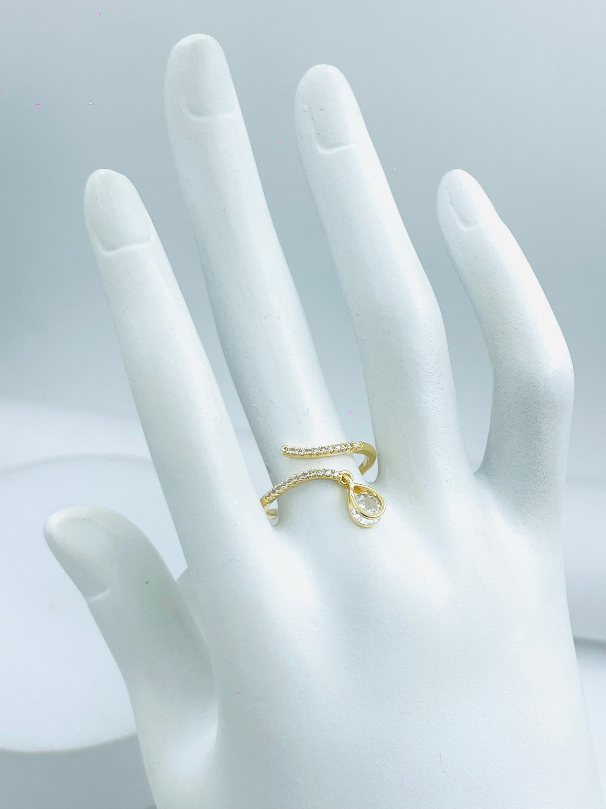 Elegant Gold Swirl Ring with Crystal Accents
