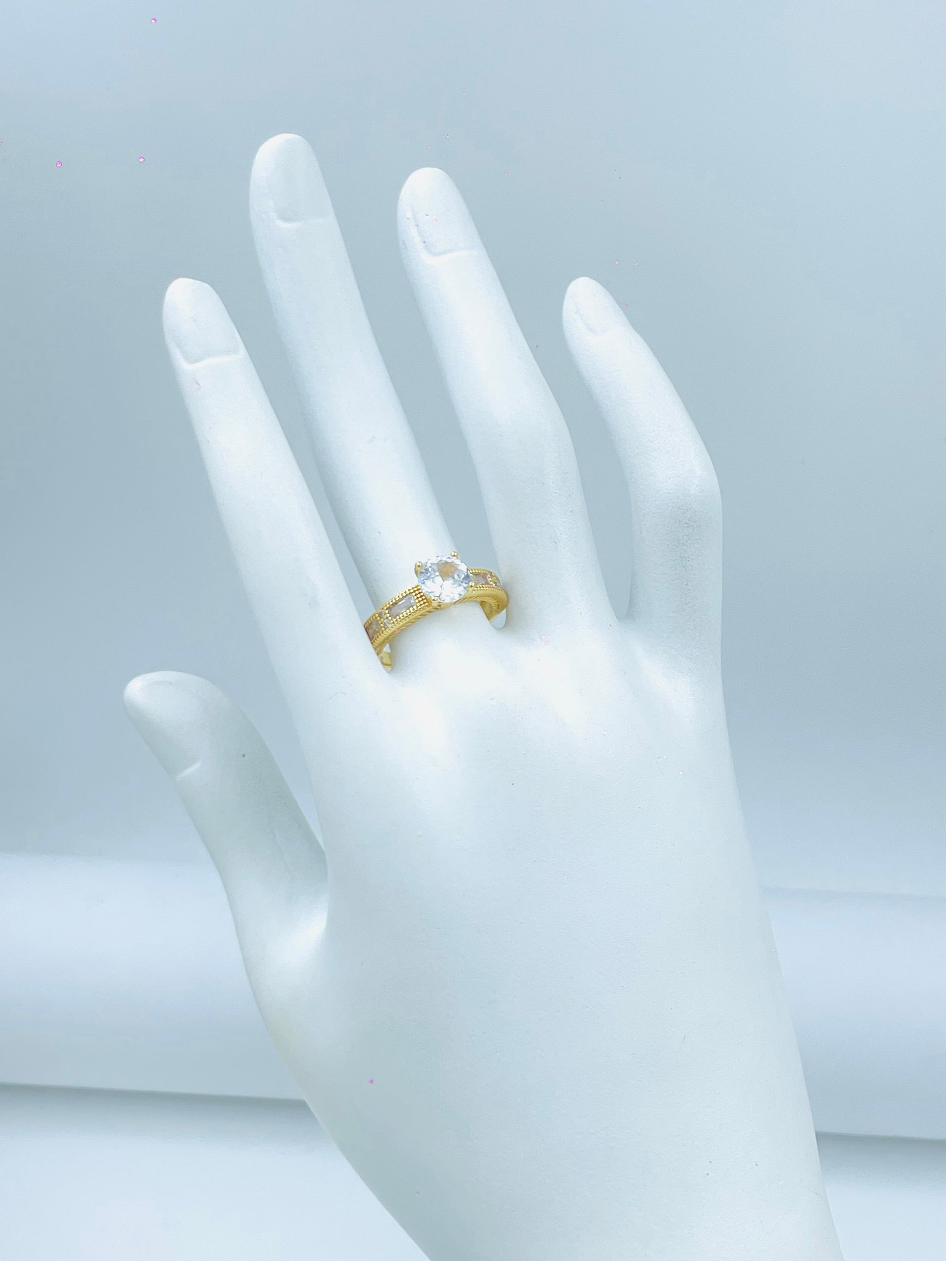 Elegant Gold Ring with Clear Gemstone