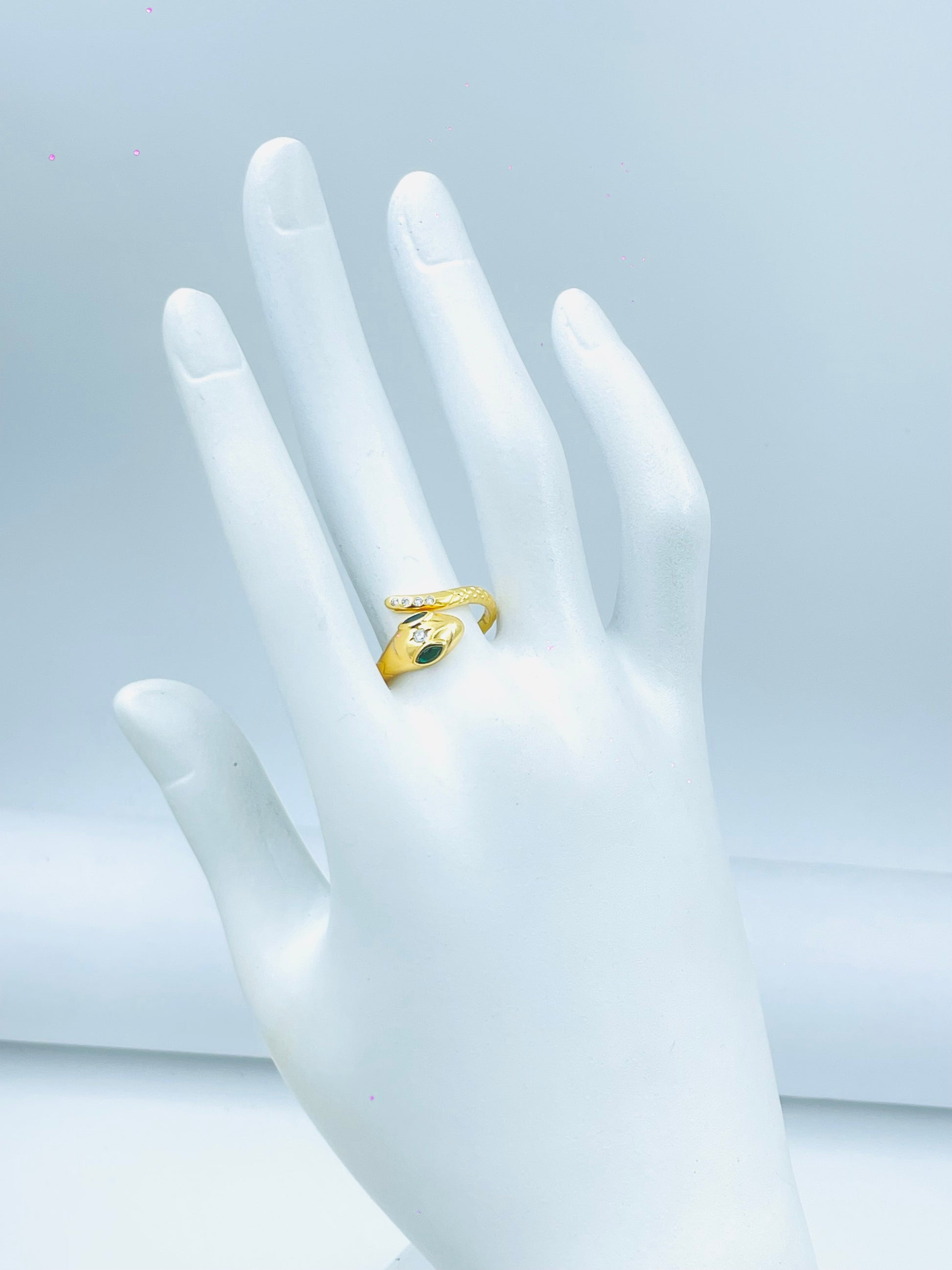 Elegant Gold Snake Ring with Green Gem