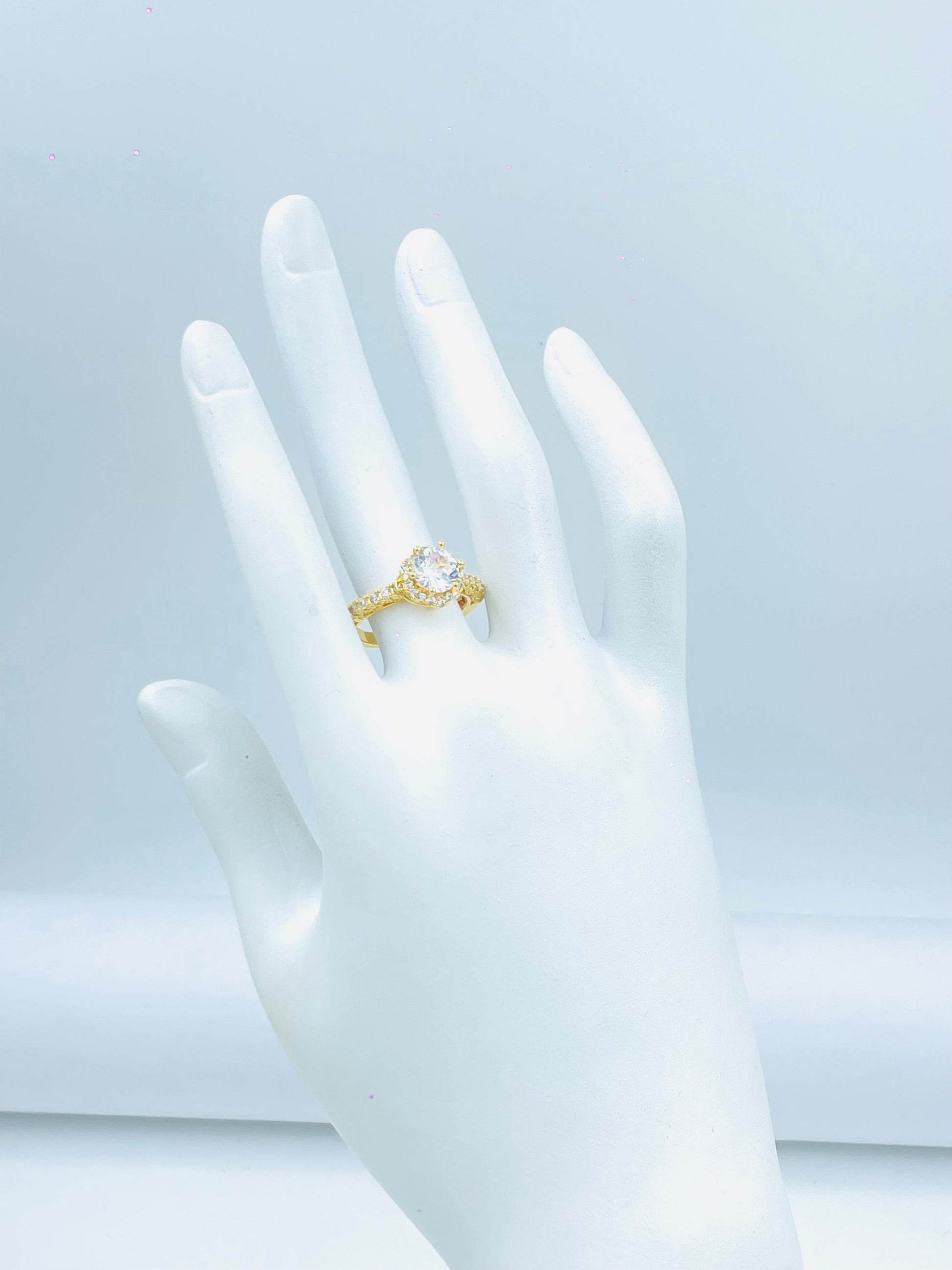 Elegant Gold Engagement Ring with Center Stone