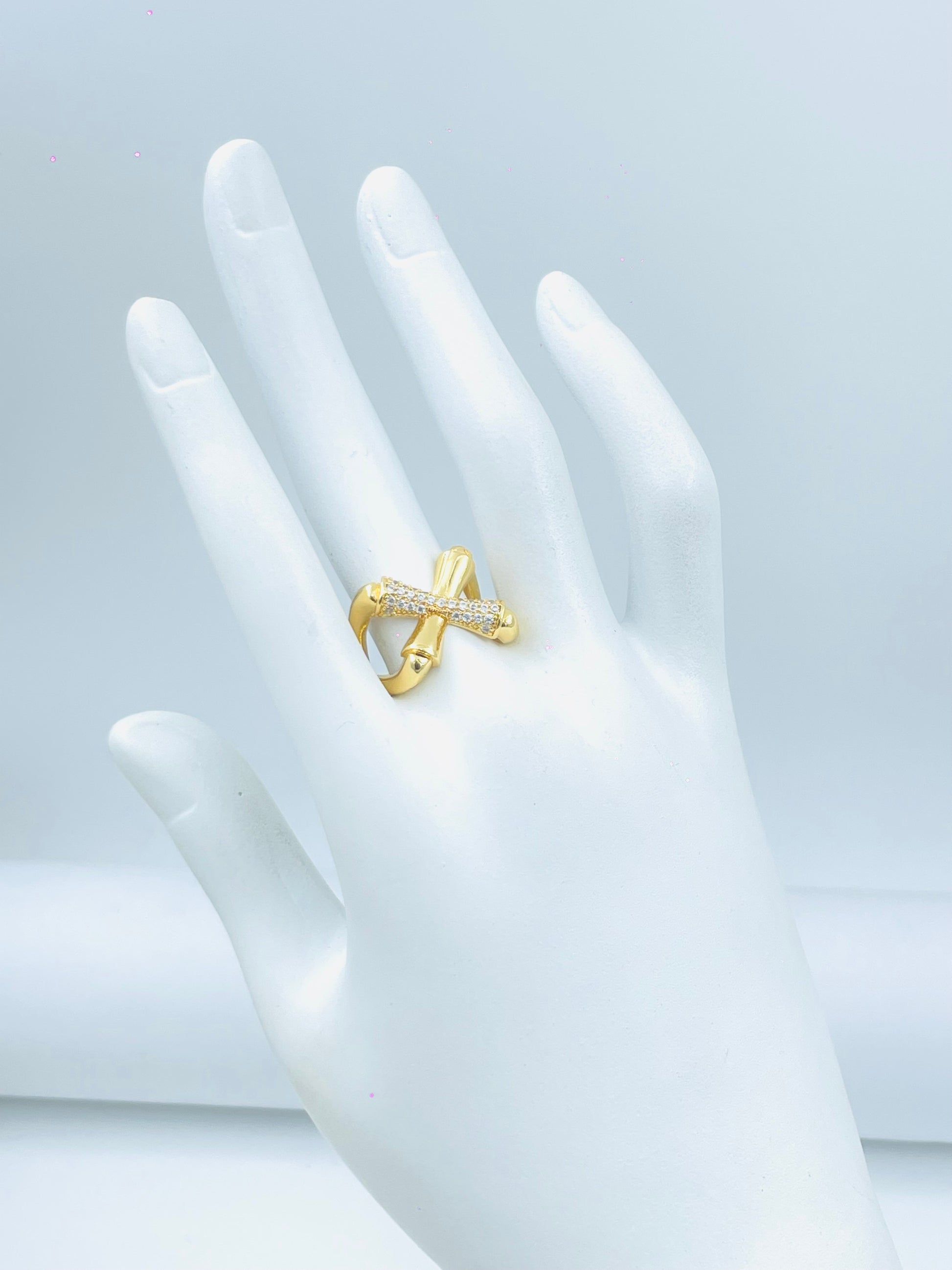 Elegant Gold Plated Crossover Ring with Sparkling Crystals