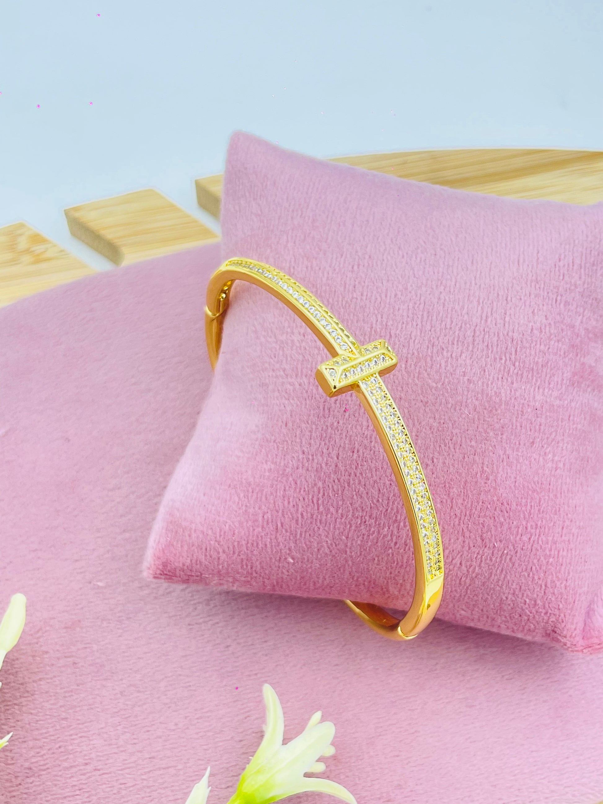 Elegant Gold Bangle Bracelet with Diamond Accents
