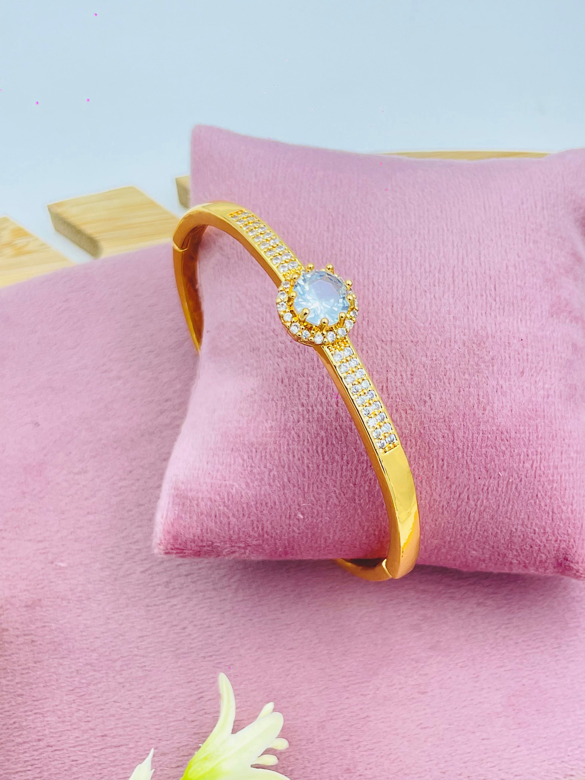 Elegant Gold Bracelet with Gemstone  Perfect for Special Occasions