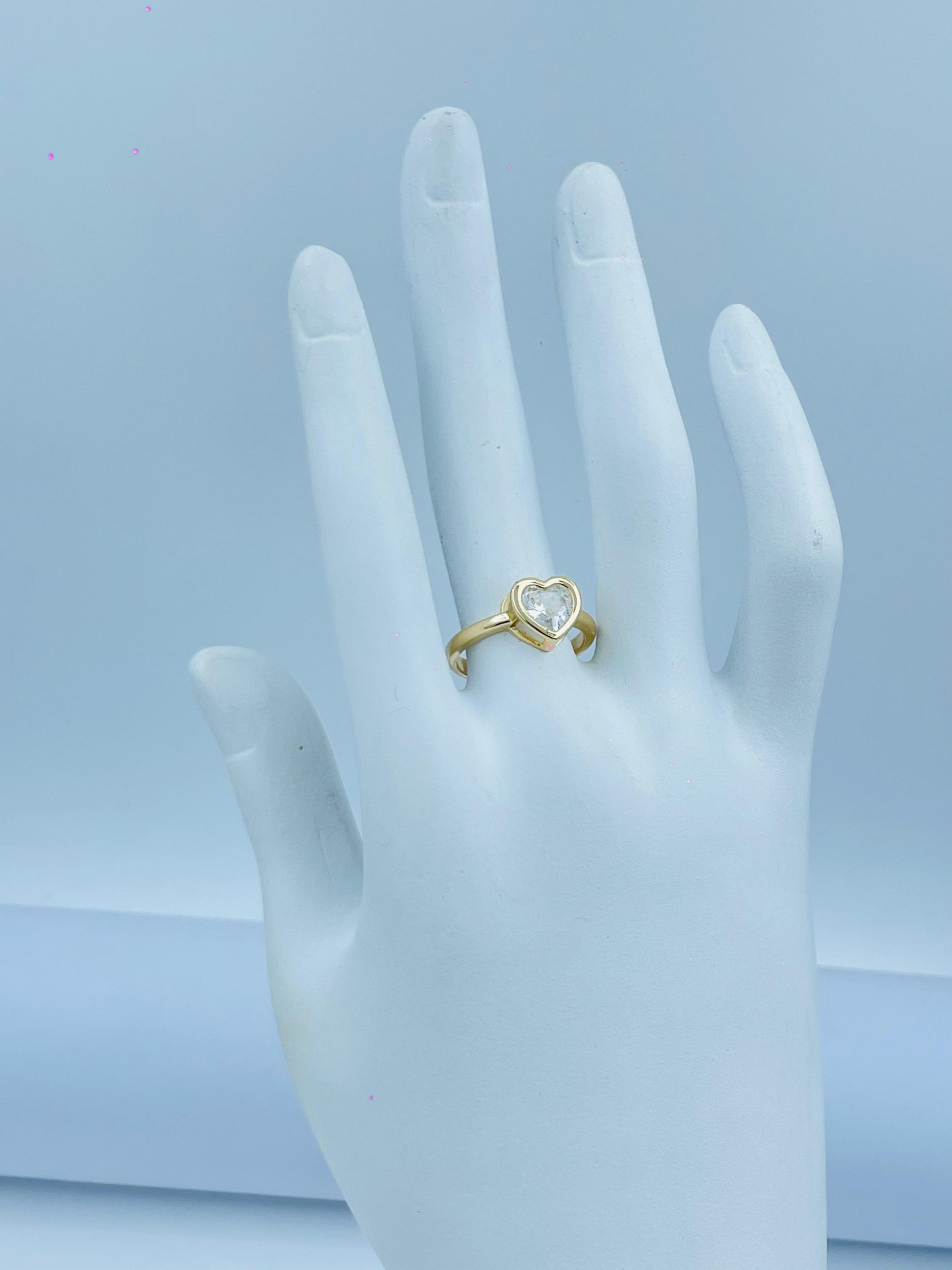 Heart-Shaped Diamond Ring with Gold Bezel Setting
