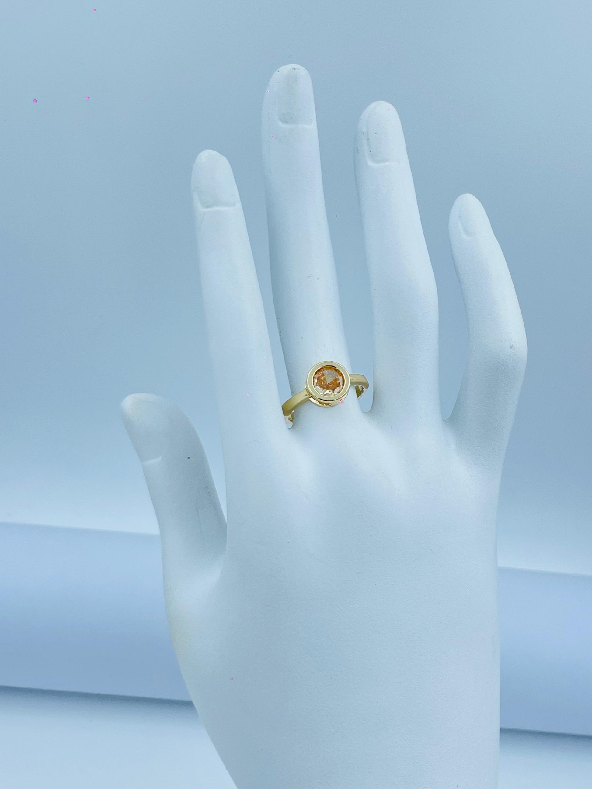 Classic Gold-Plated Ring with Amber-Colored Stone