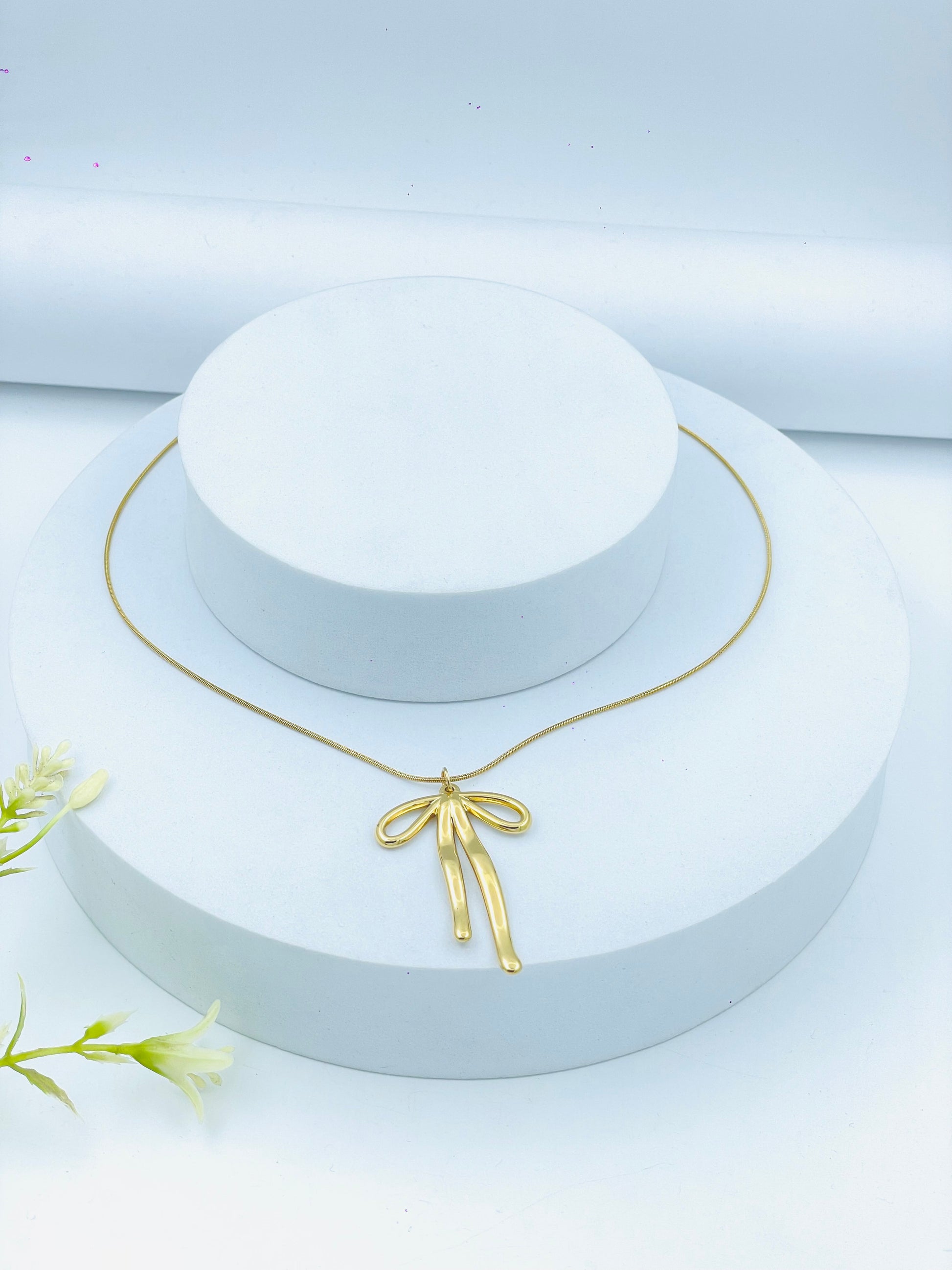 Elegant Gold Bow Pendant Necklace for Women  Stylish Jewelry