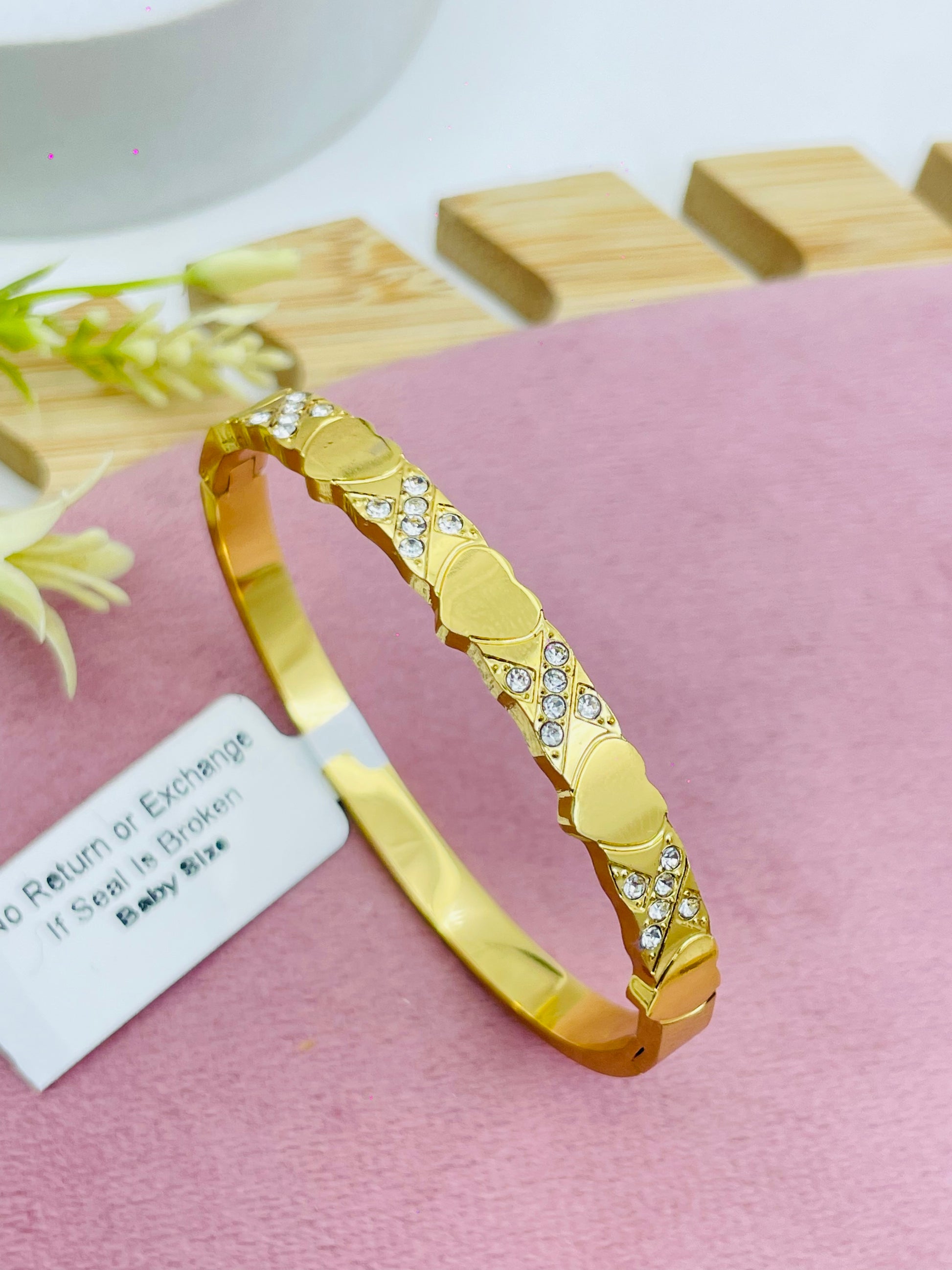 Elegant Gold Heart Bangle with Diamond Accents