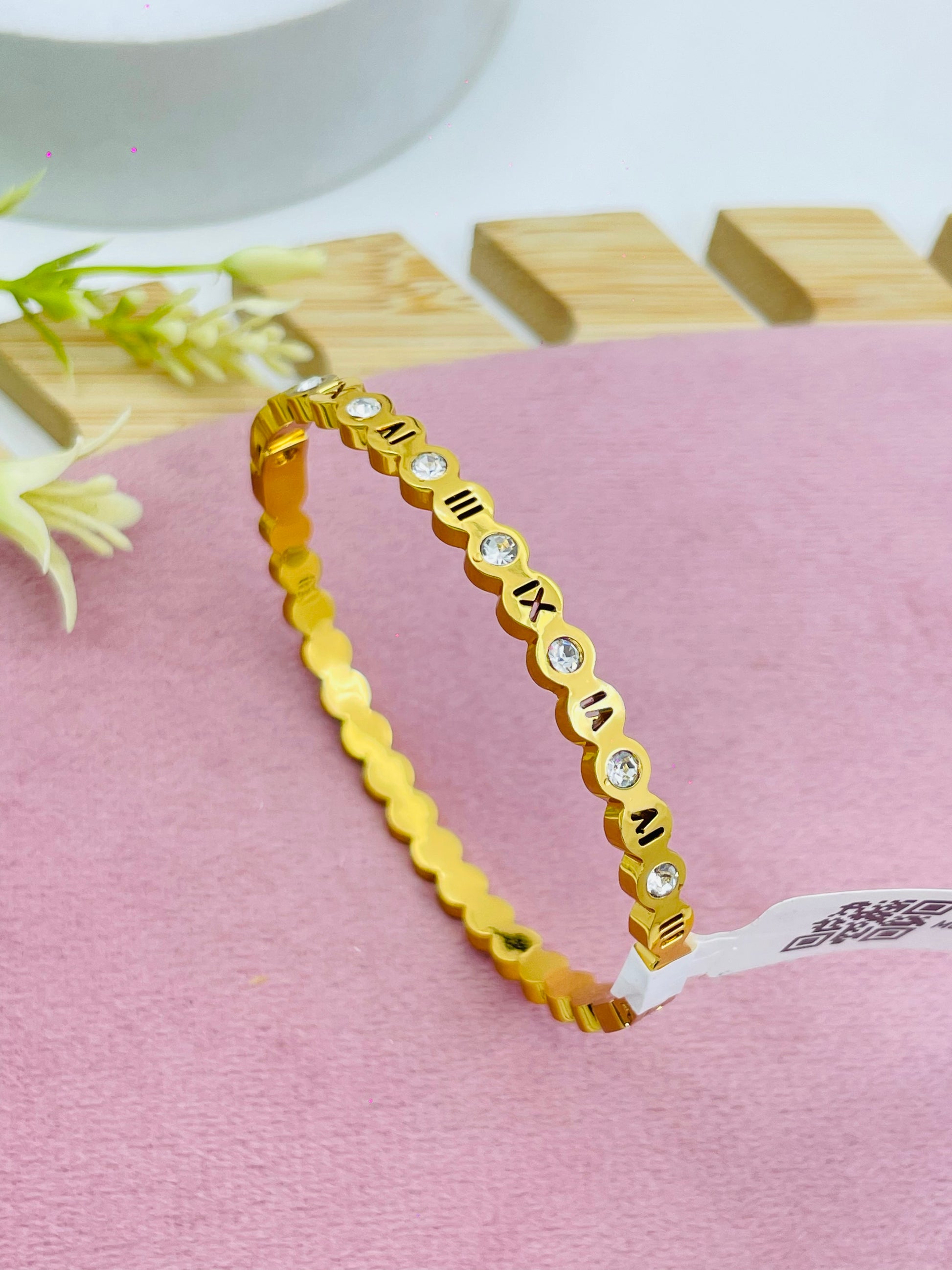 Elegant Gold Roman Numeral Bracelet with Diamonds