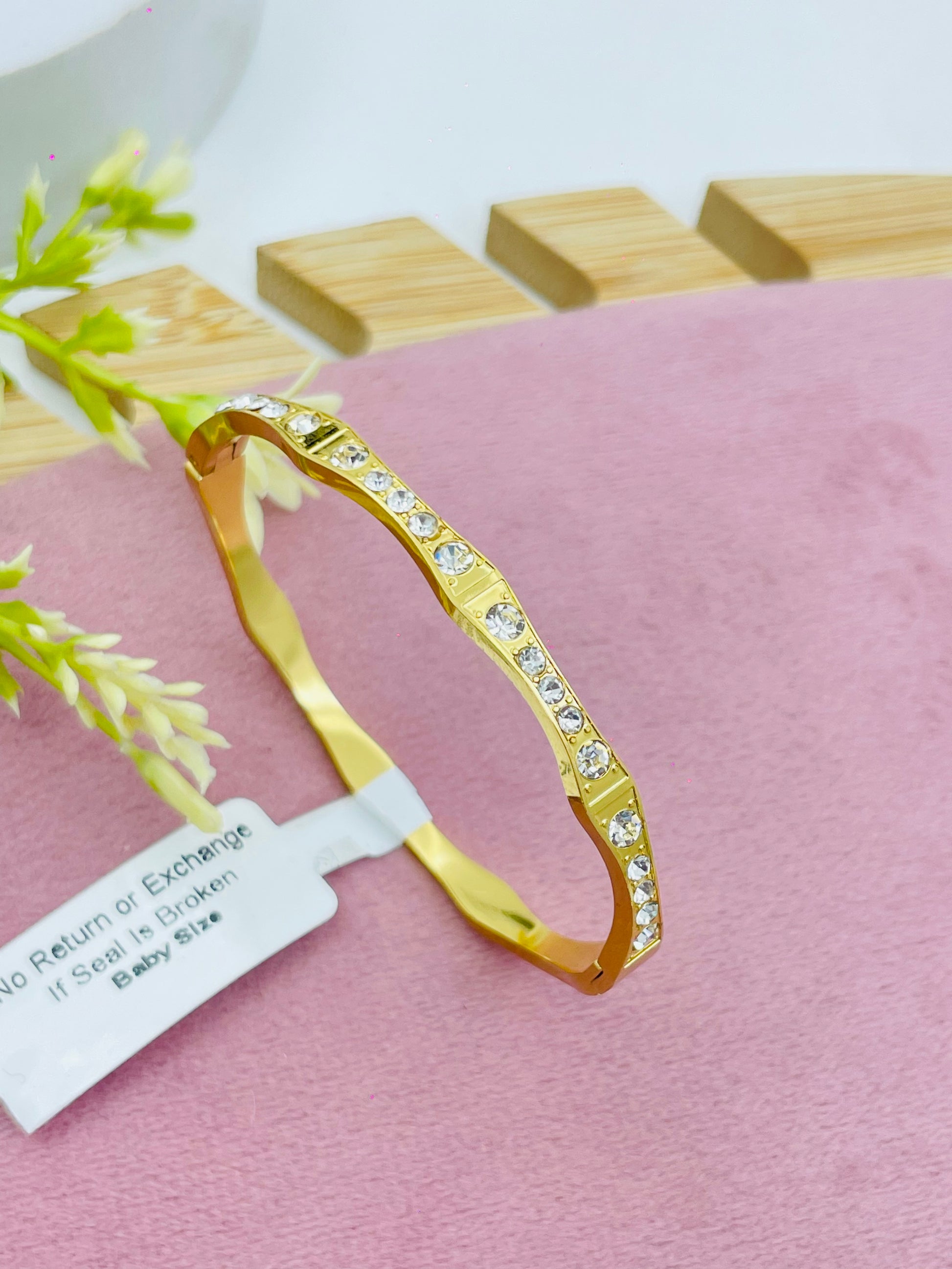 Elegant Gold Bangle with Crystal Accents