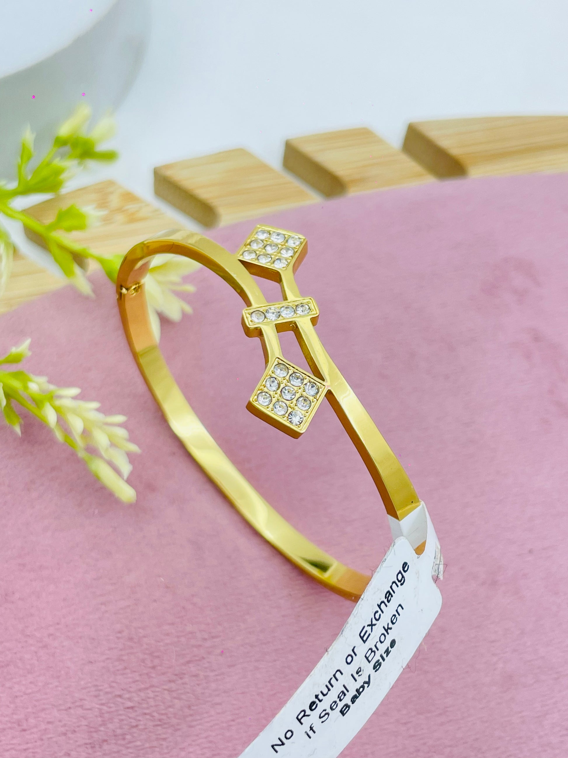 Elegant Gold Bangle with Diamond Accents