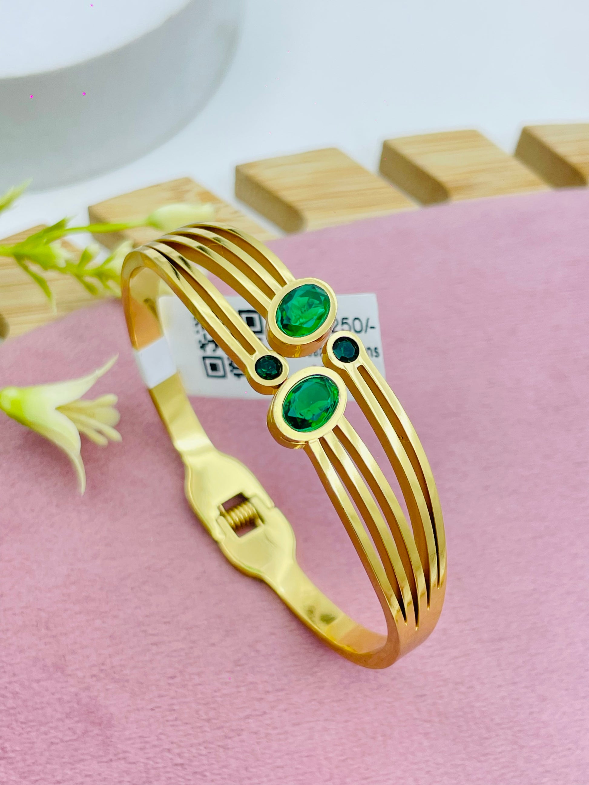 Elegant Gold Bracelet with Green Gemstones  Perfect for Any Occasion