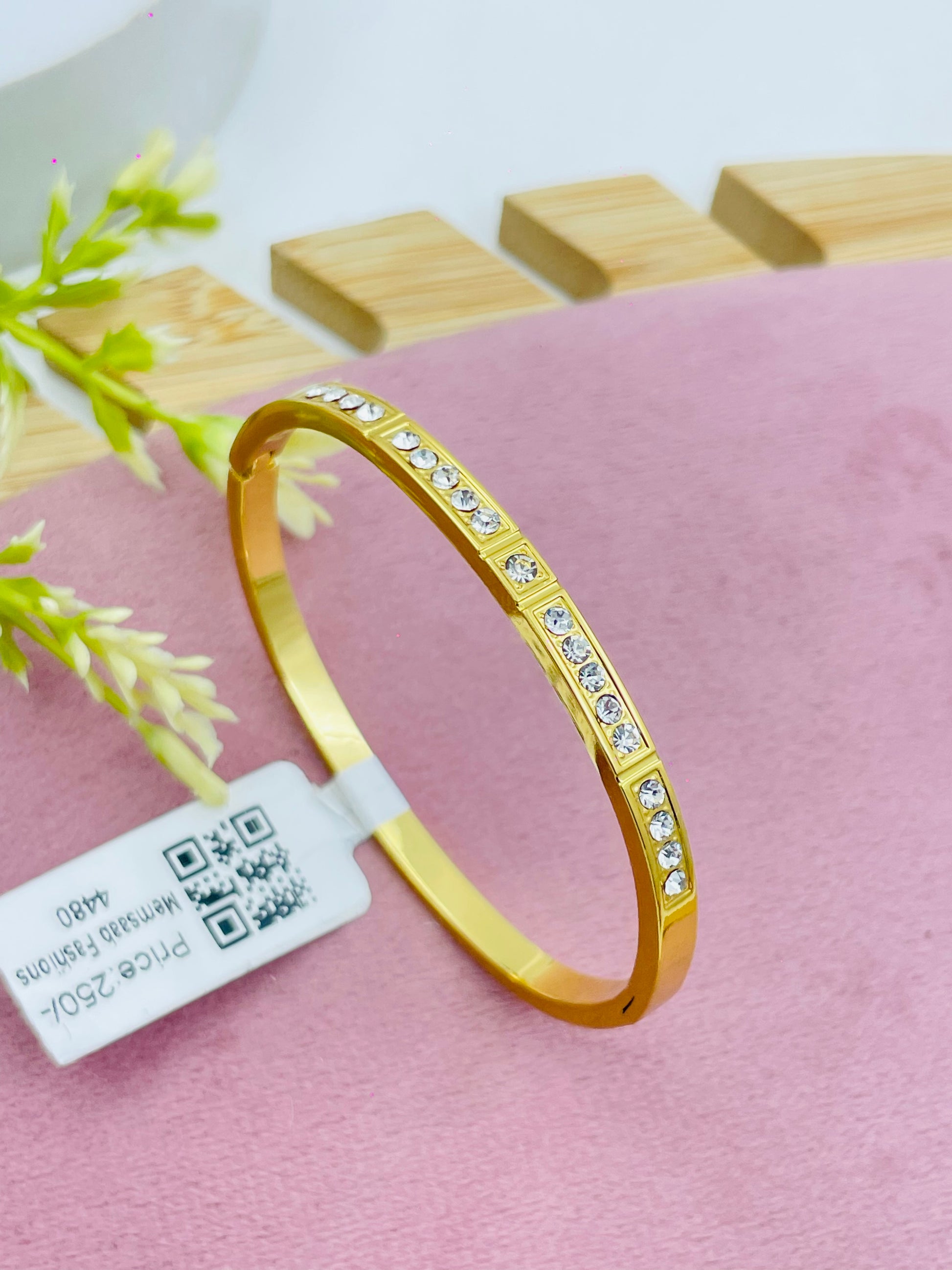 Elegant Gold Bangle with Crystal Accents