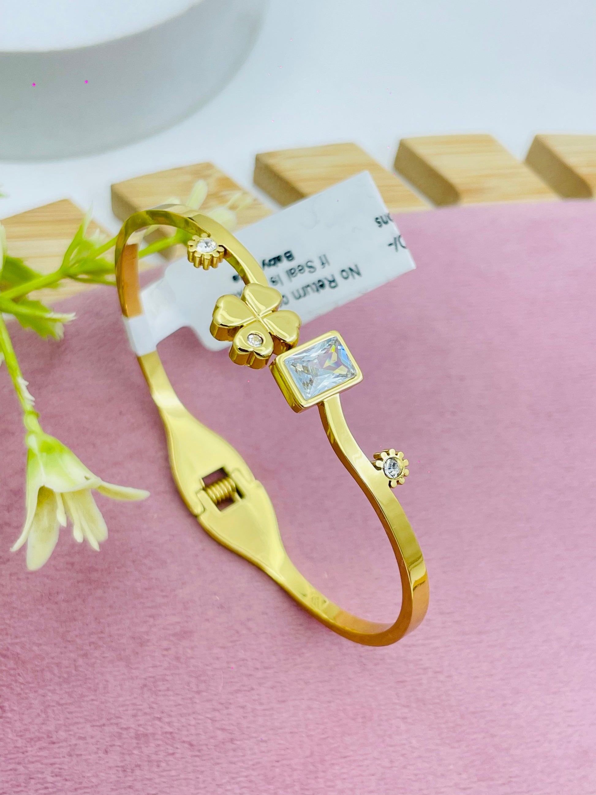 Elegant GoldPlated Bangle with Floral Design