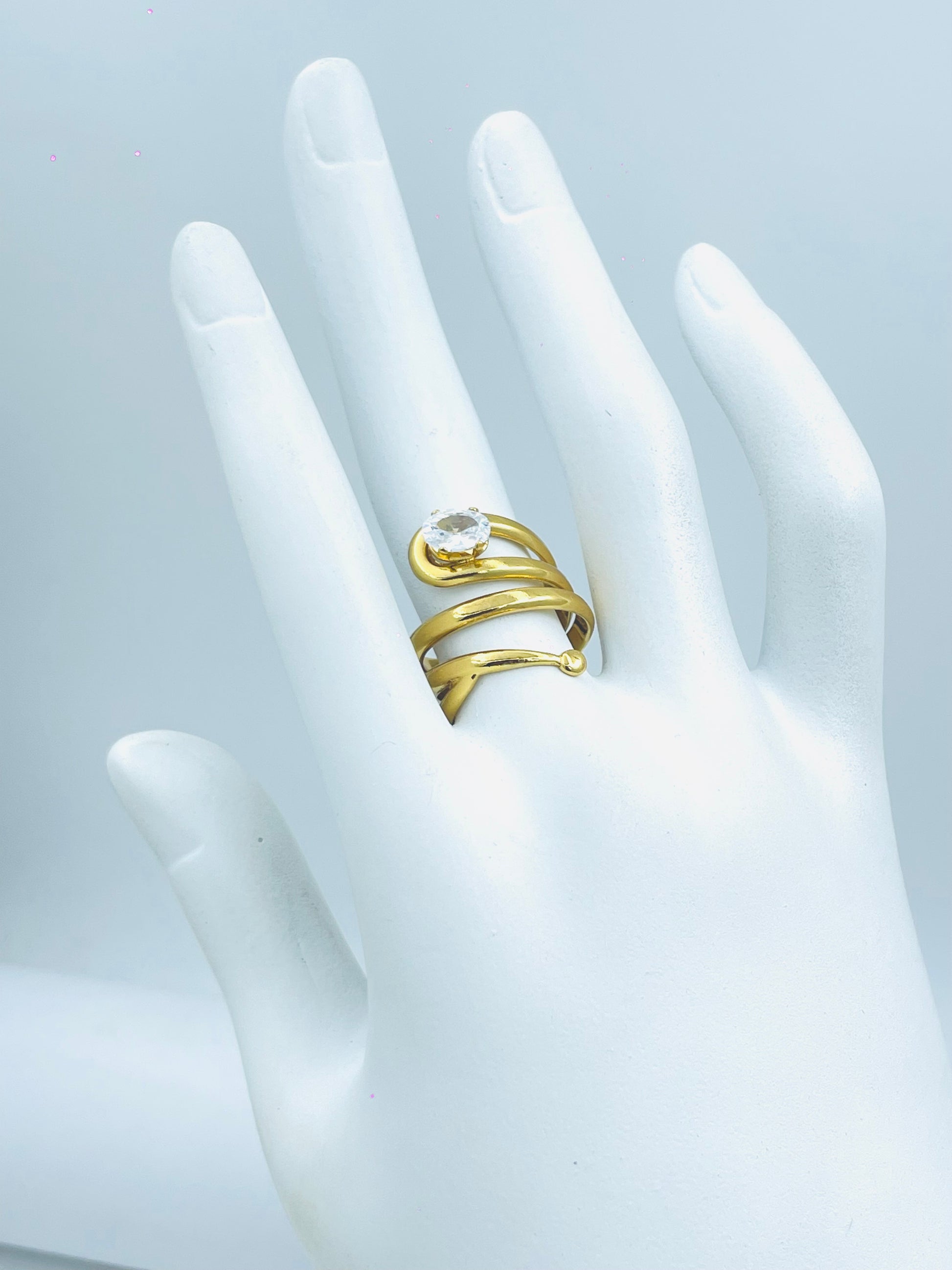 Elegant Gold Spiral Ring with Stunning Clear Stone