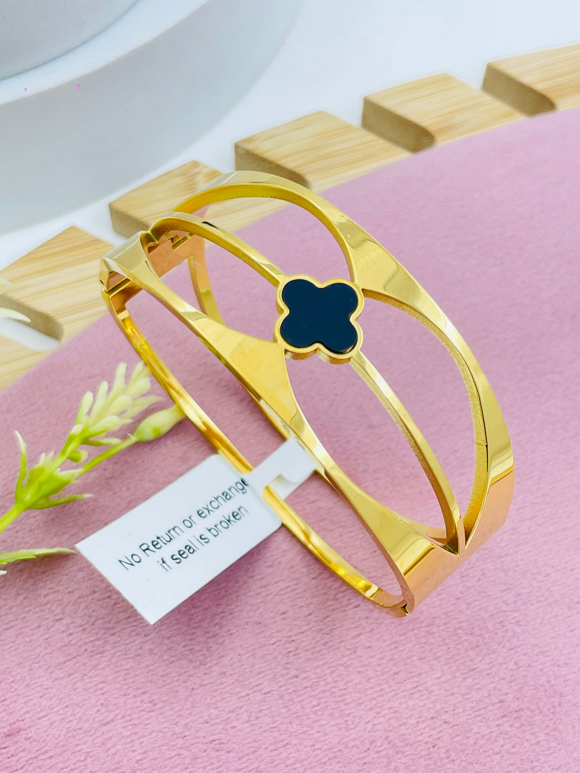 Elegant GoldPlated Open Cuff Bracelet with Black Accent