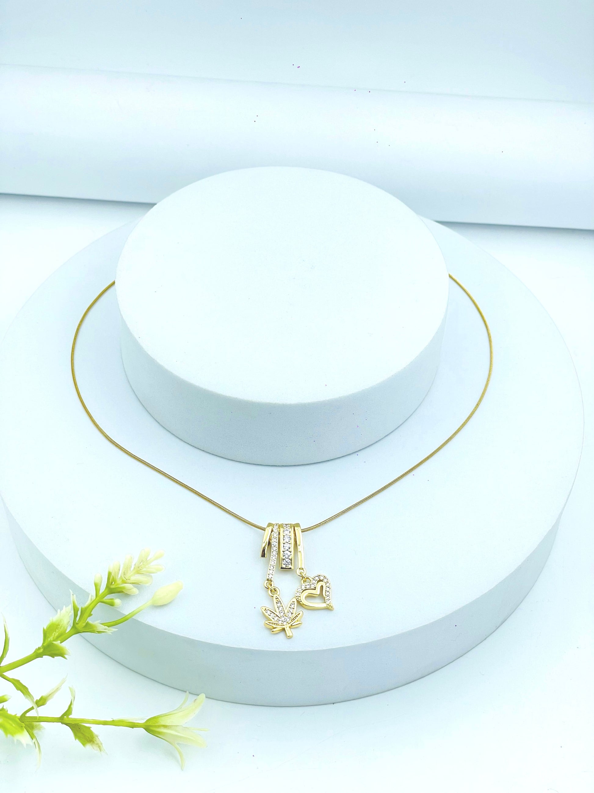 Elegant Gold Pendant Necklace with Heart and Bird Charms