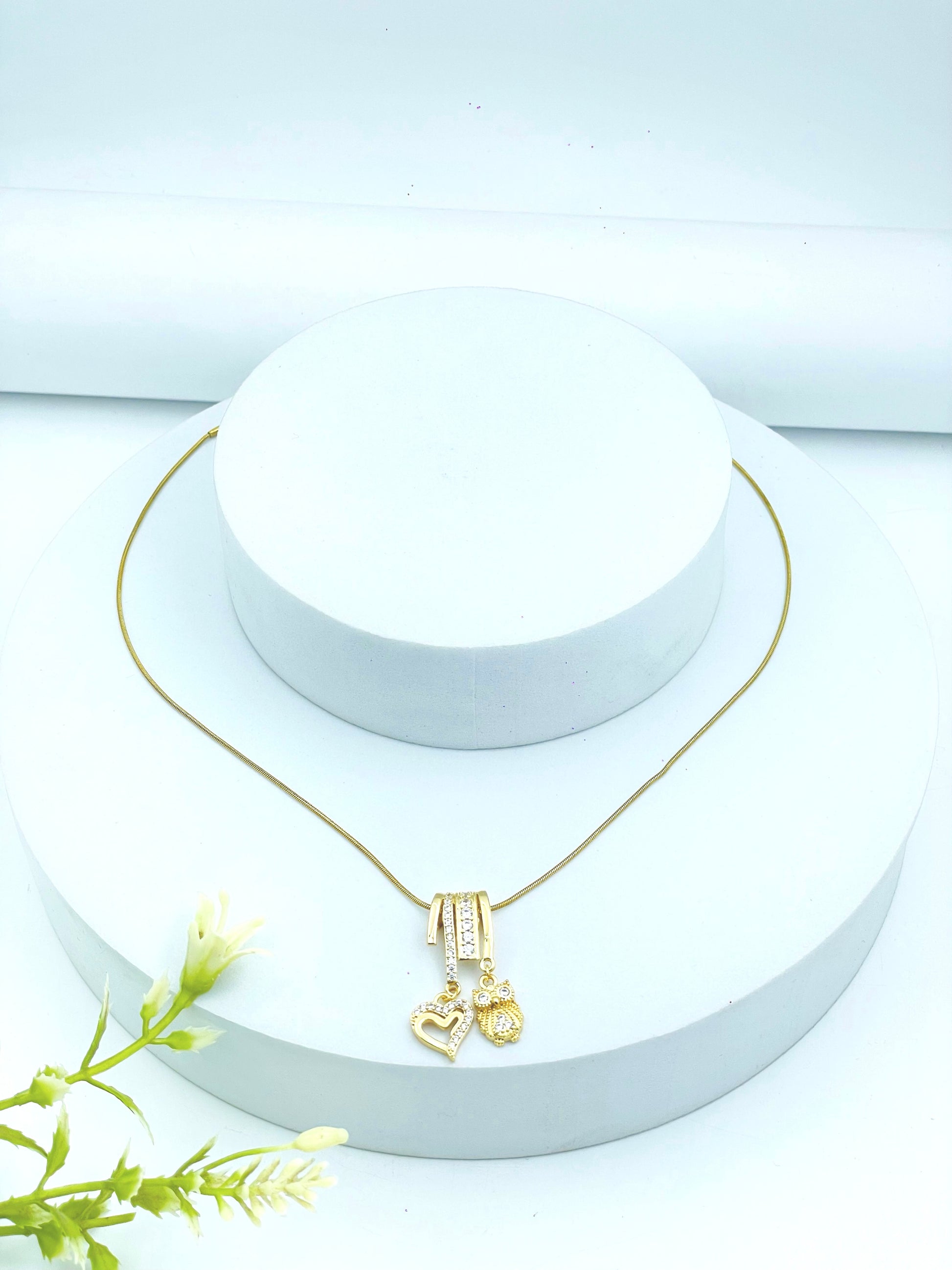 Elegant Golden Necklace with Heart and Bear Pendants