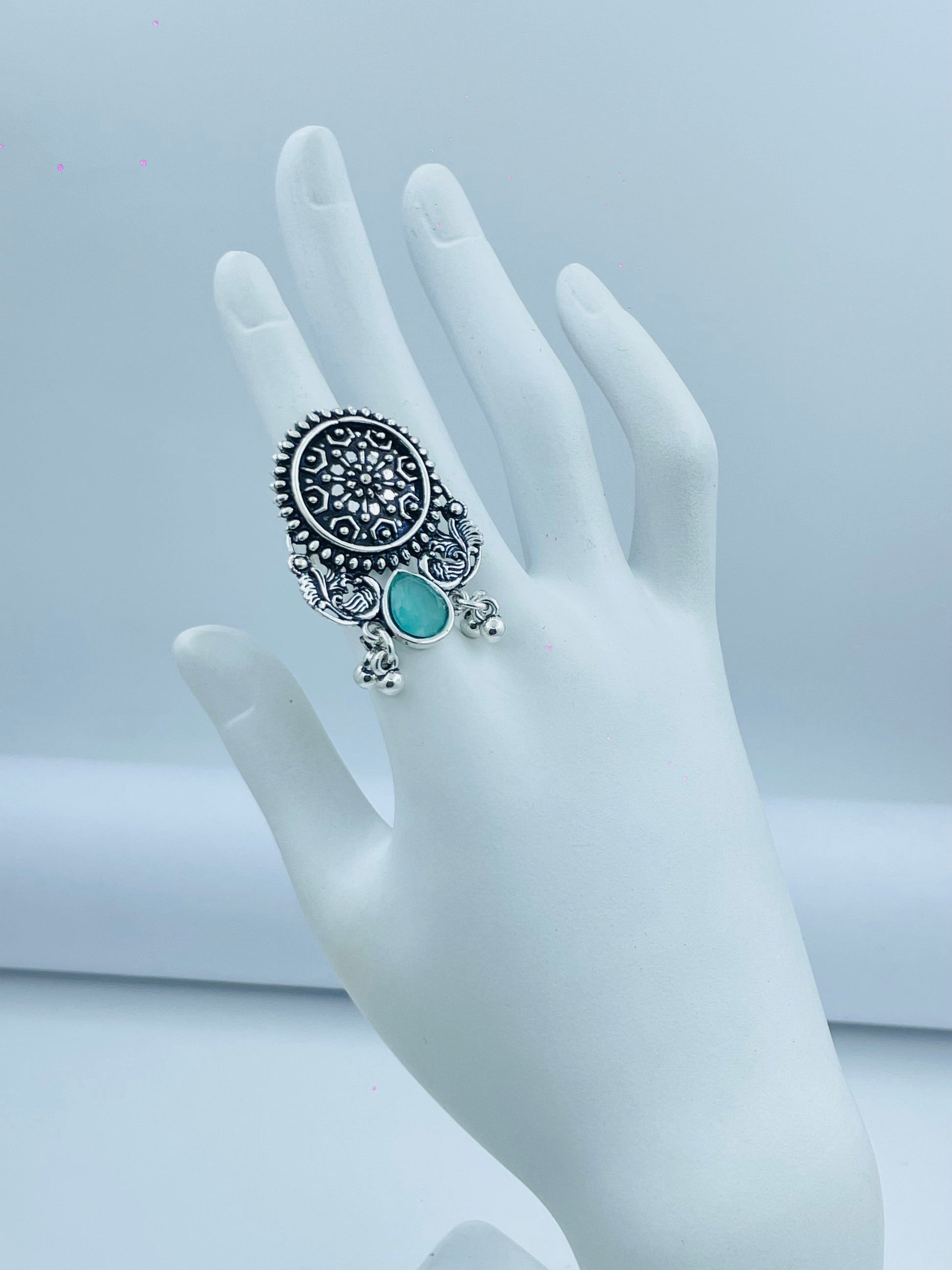 Elegant Silver Ornate Oval Ring with Turquoise Stone