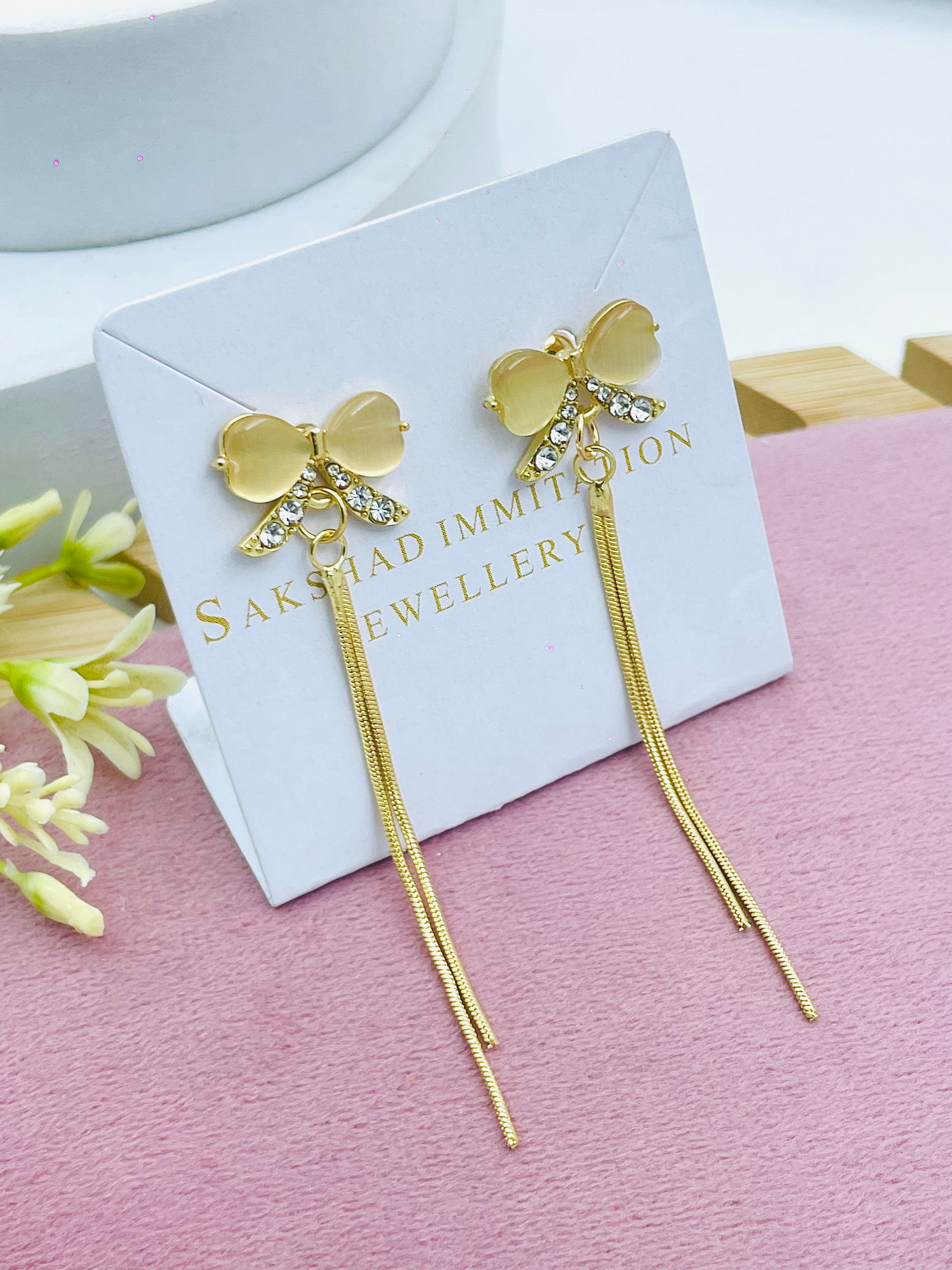 Elegant Bow and Tassel Gold Earrings