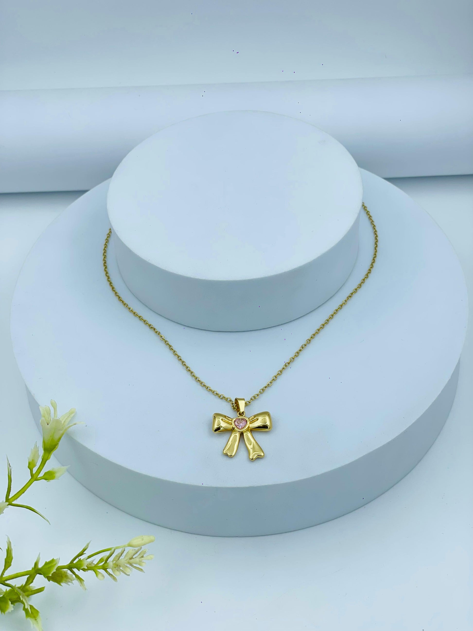 Gold Bow Pendant Necklace – Anti-Tarnish Chain with Pink Stone Accent