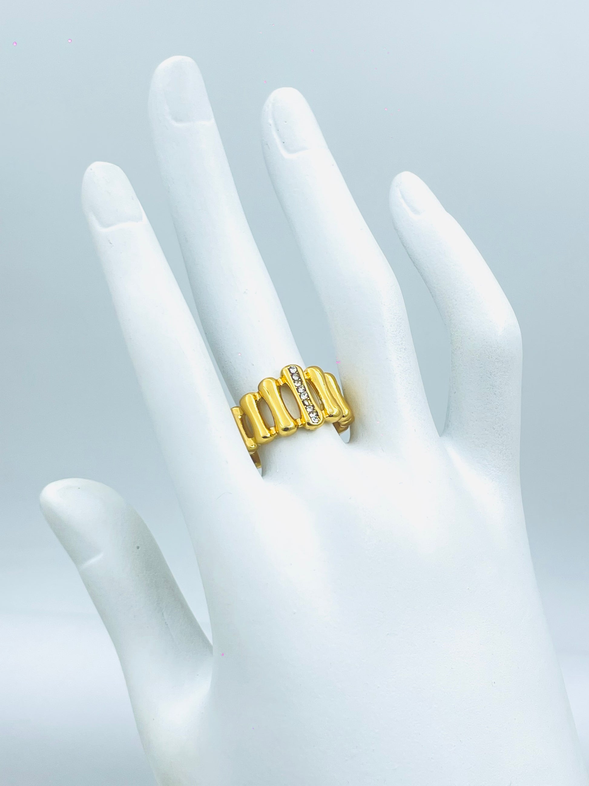 Elegant Gold Ring with Diamond Accents