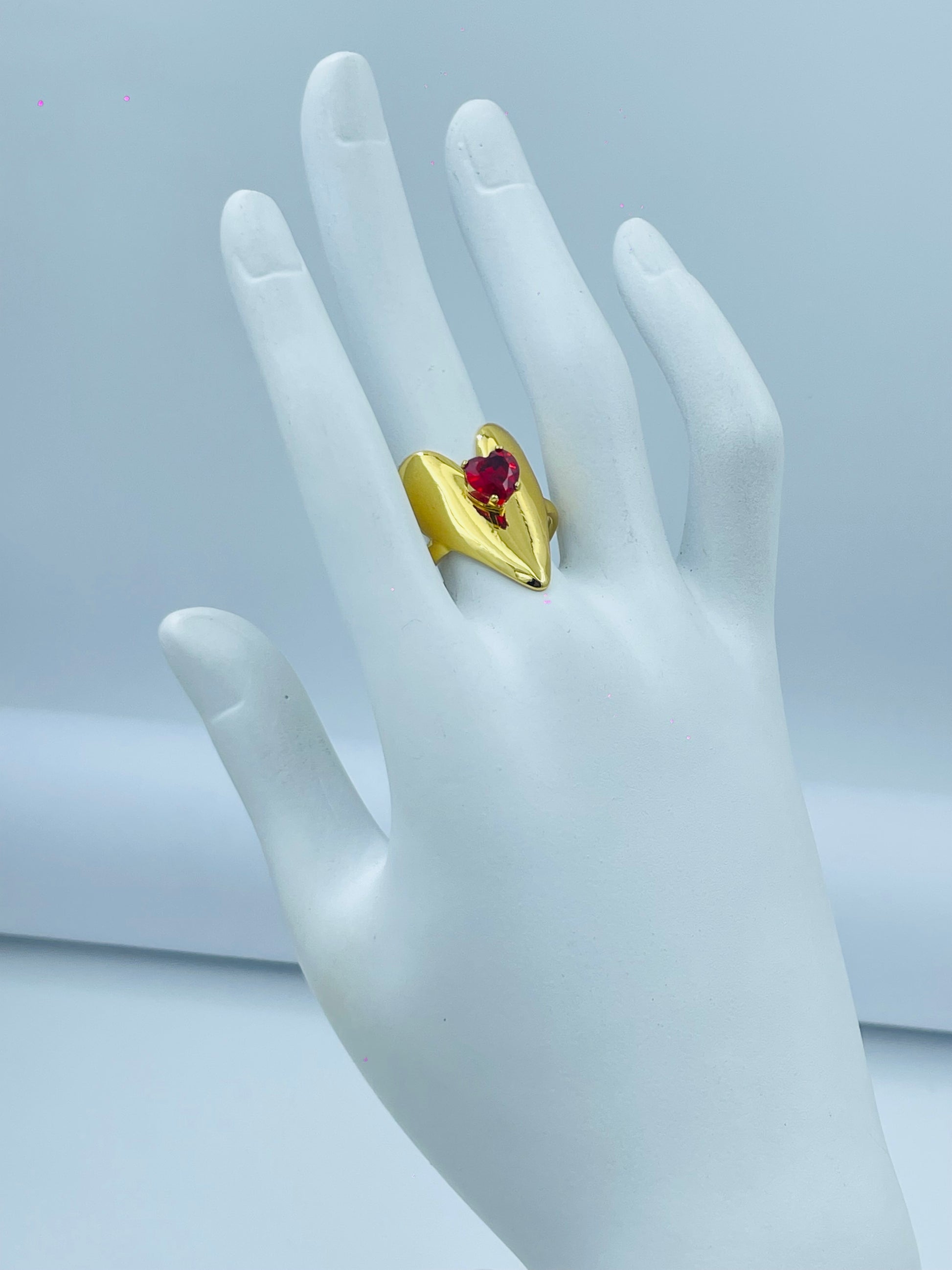 Elegant Gold Heart Ring with Red Gemstone