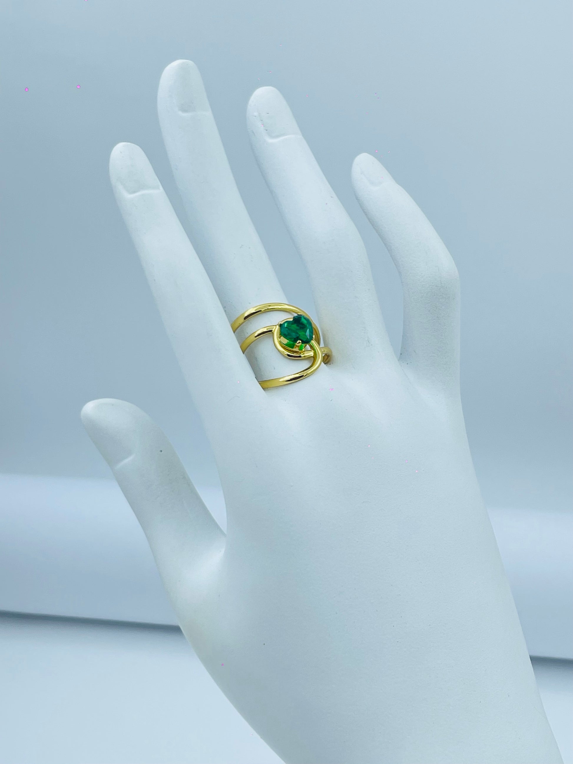Elegant Gold Ring with Green Gemstone