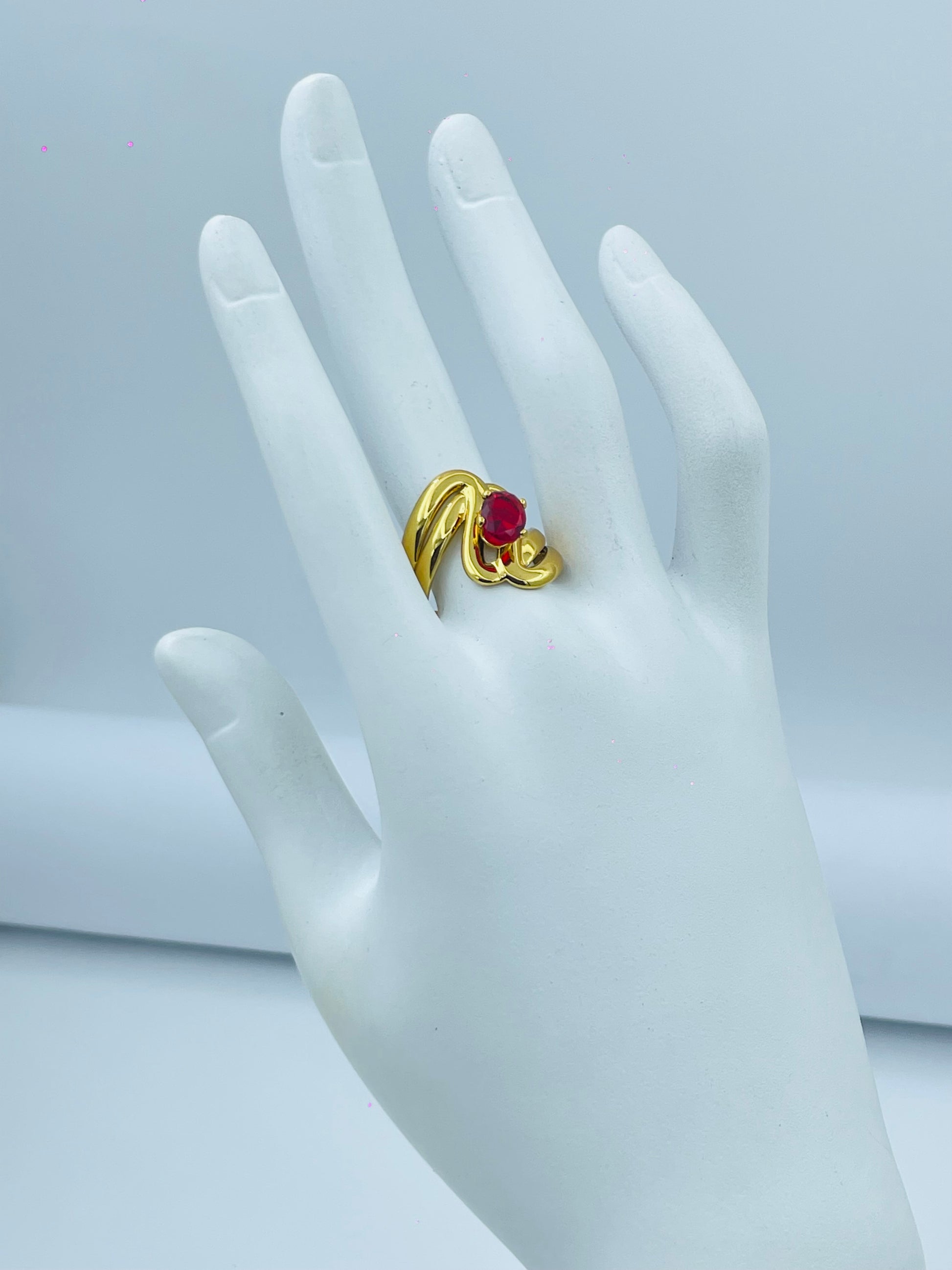 Elegant Gold Plated Ring with Red Gemstone