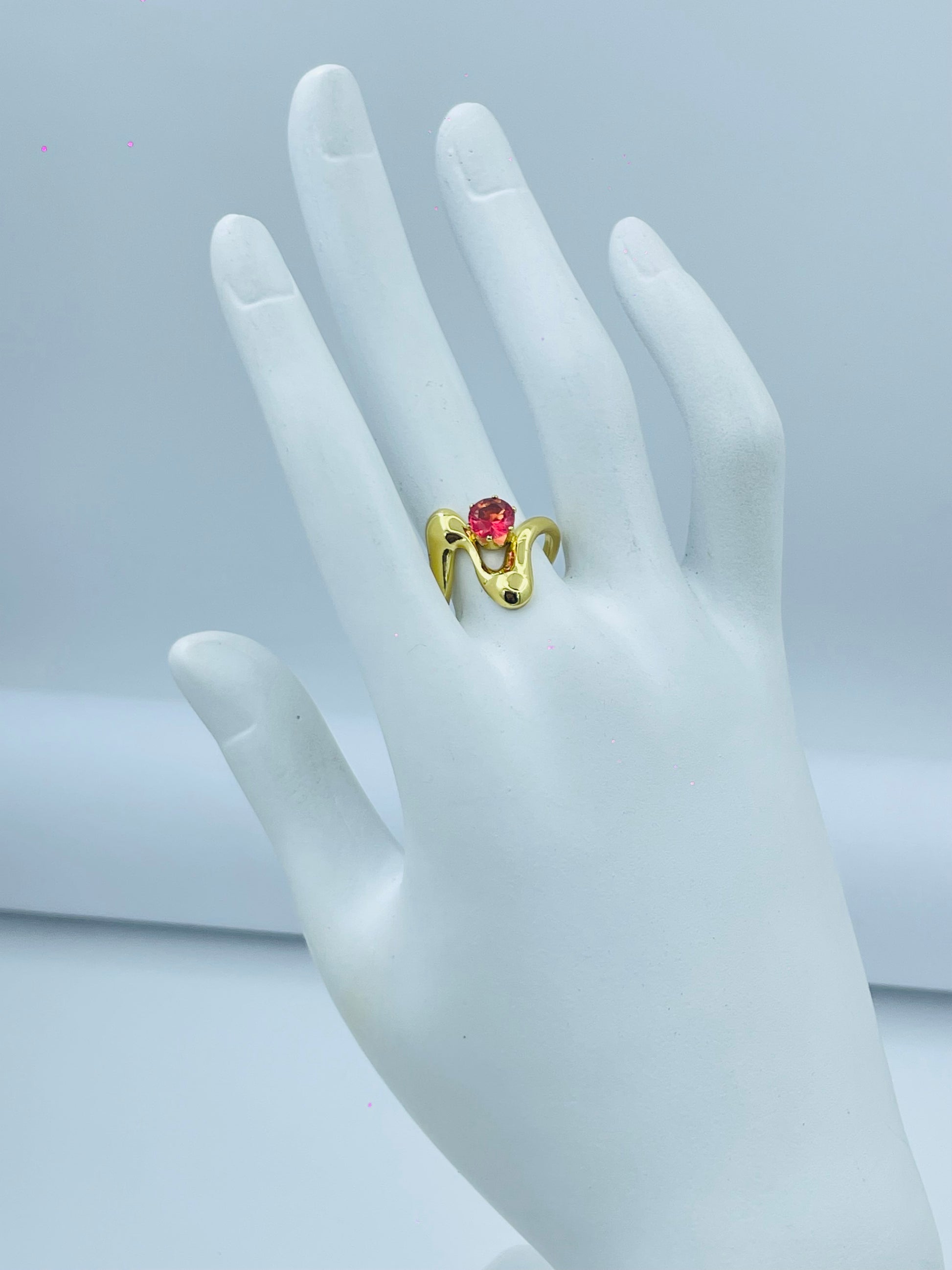 Elegant Gold Ring with Red Gemstone