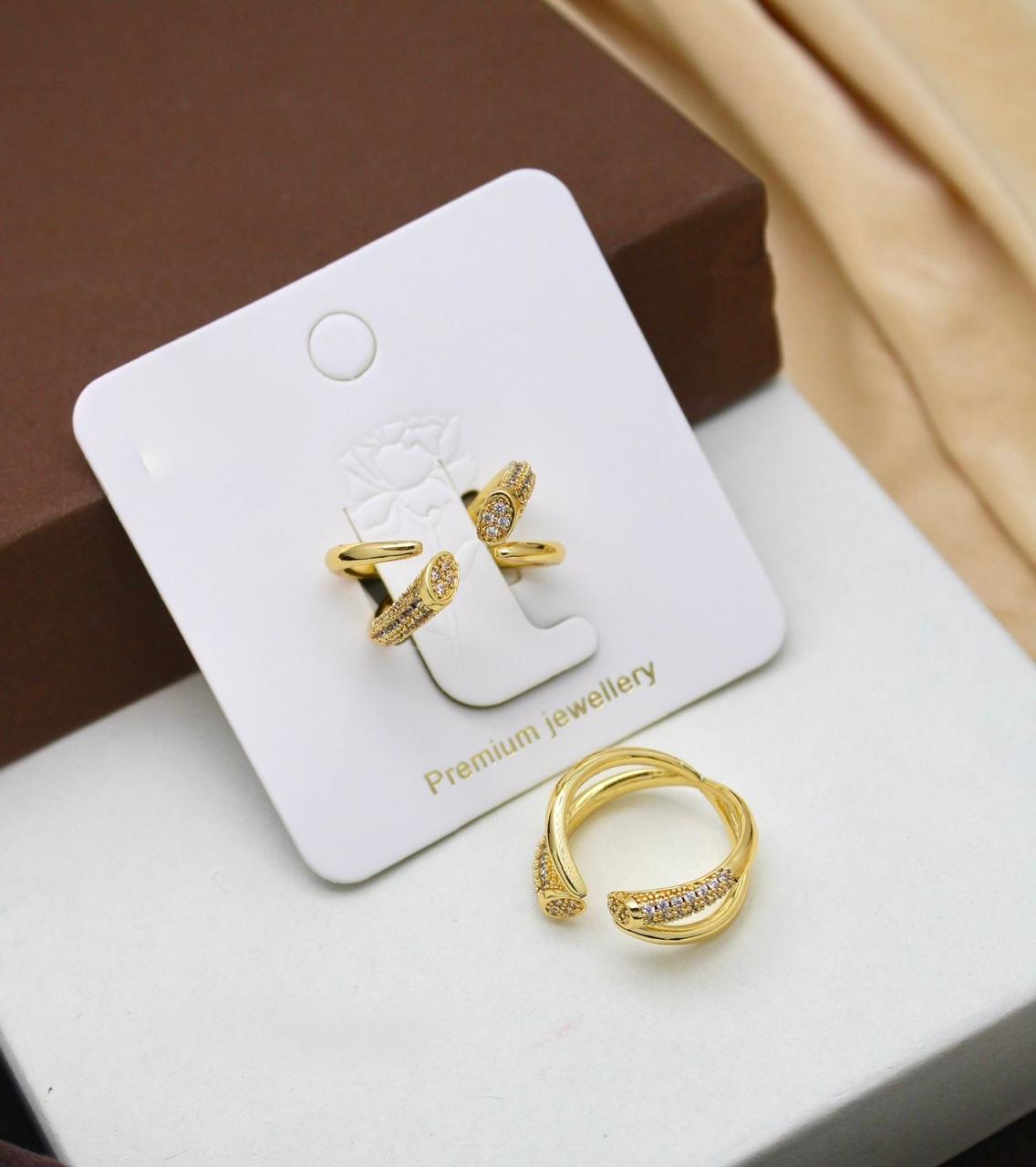 Elegant GoldTone Twist Ring Set with Embedded Stones