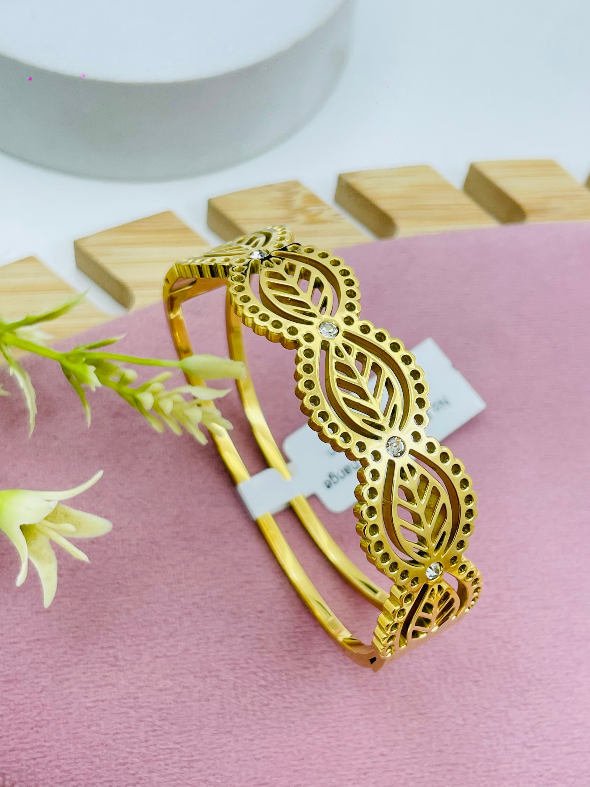 Elegant Gold Plated Leaf Design Bracelet with Crystals
