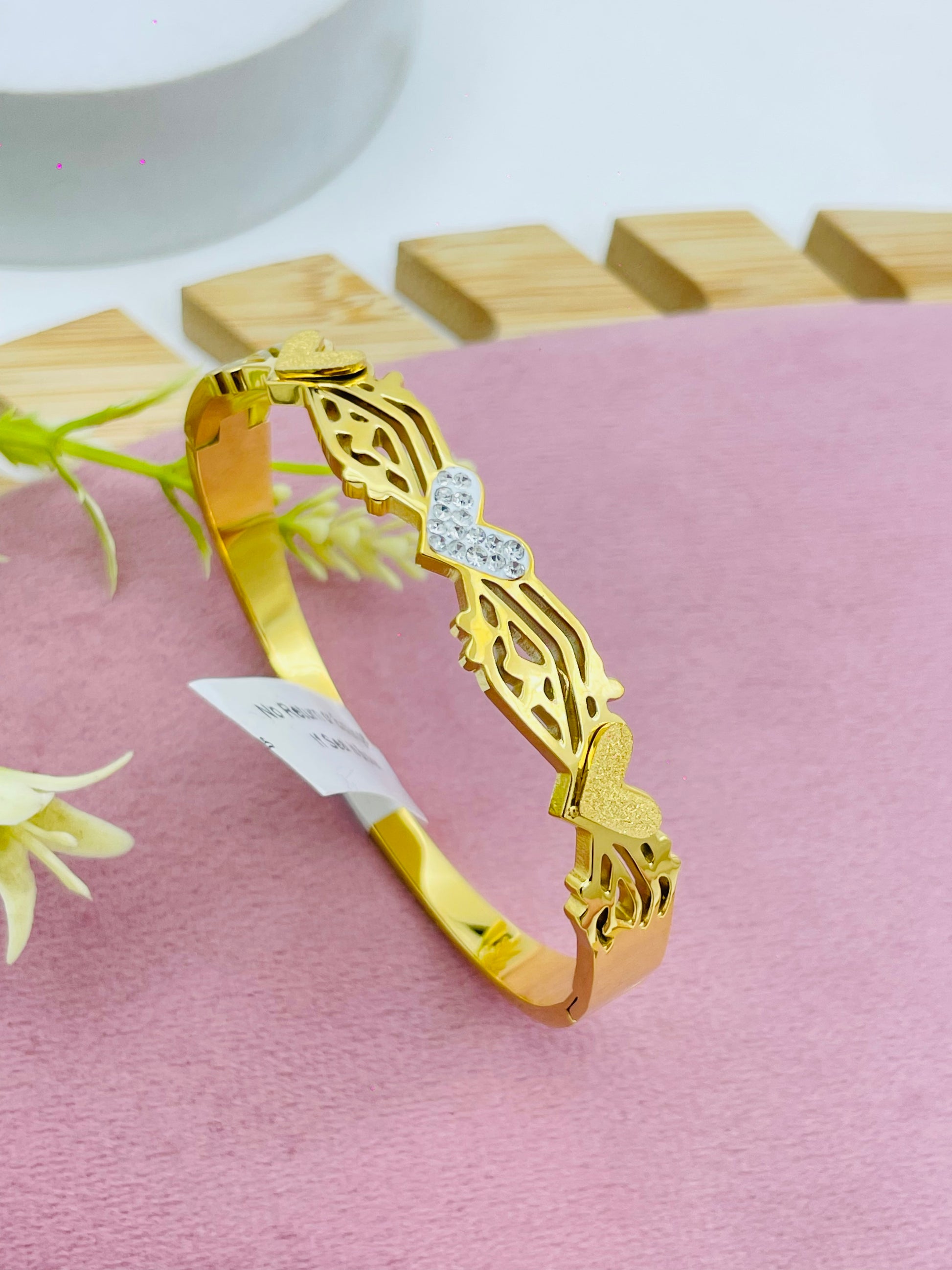 Elegant Gold and Silver Heart Bangle