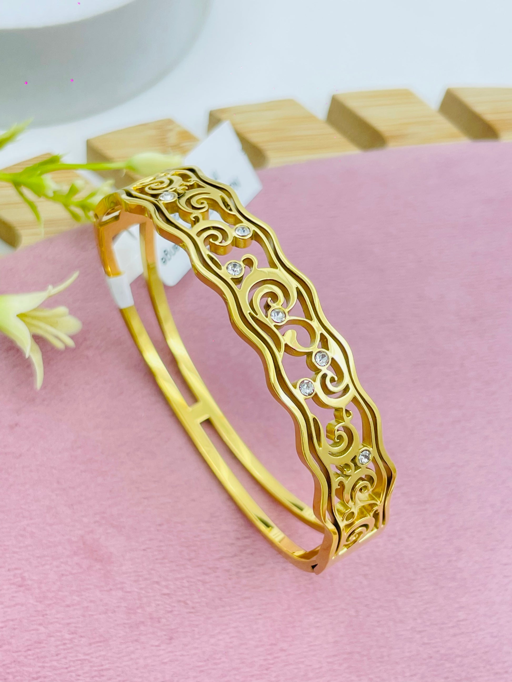 Elegant Gold Bangle with Diamond Accents