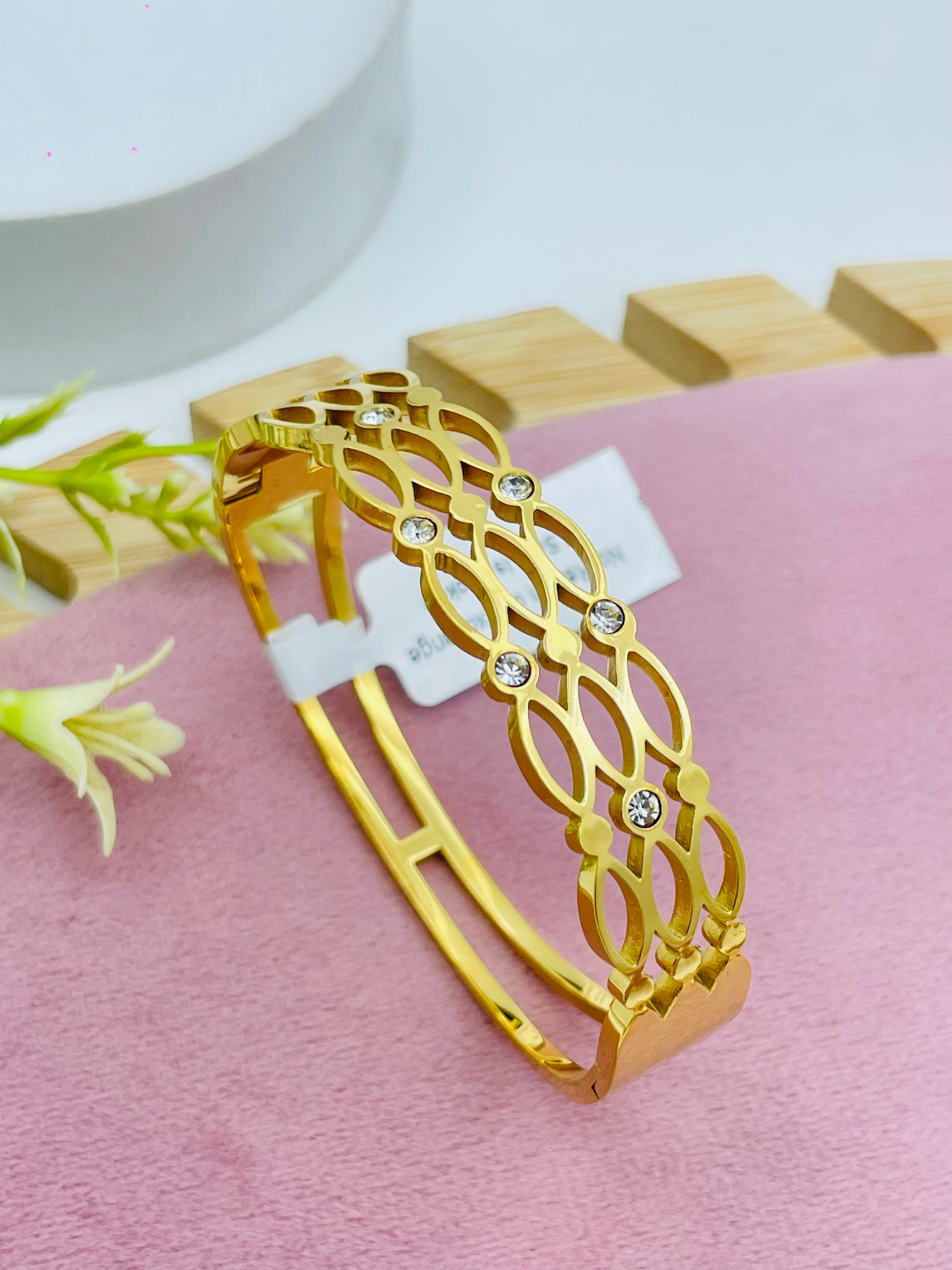 Elegant Gold Plated Floral Bangle with Gemstones