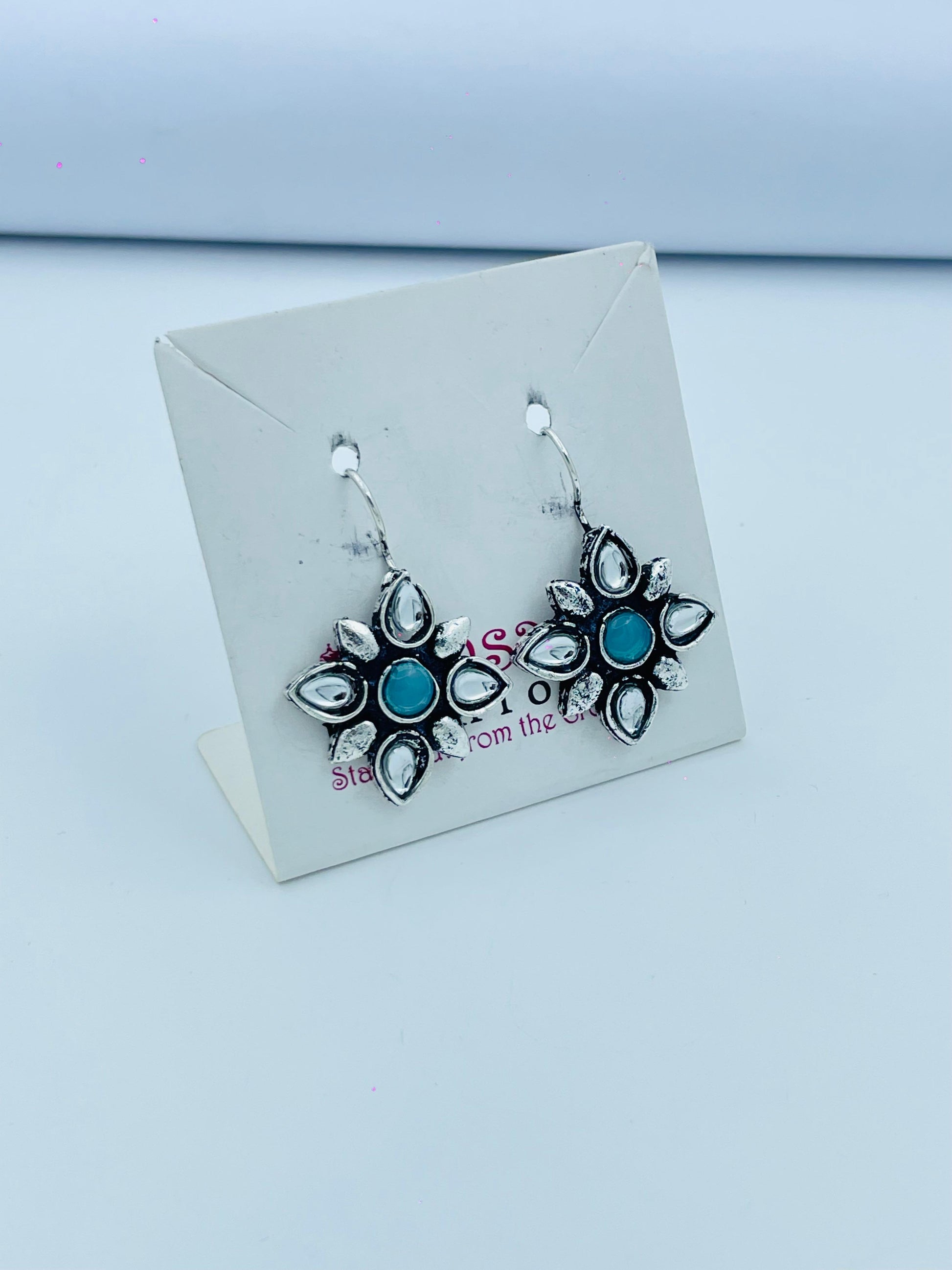 Elegant Flower Shaped Earrings with Turquoise Center - Stylish and Unique Jewelry