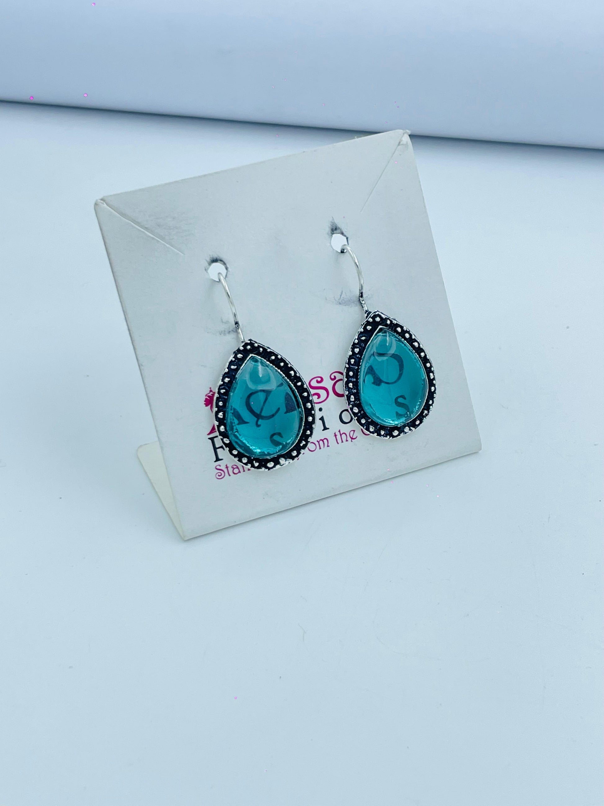 Chic Turquoise Teardrop Dangle Earrings with Silver Detailing