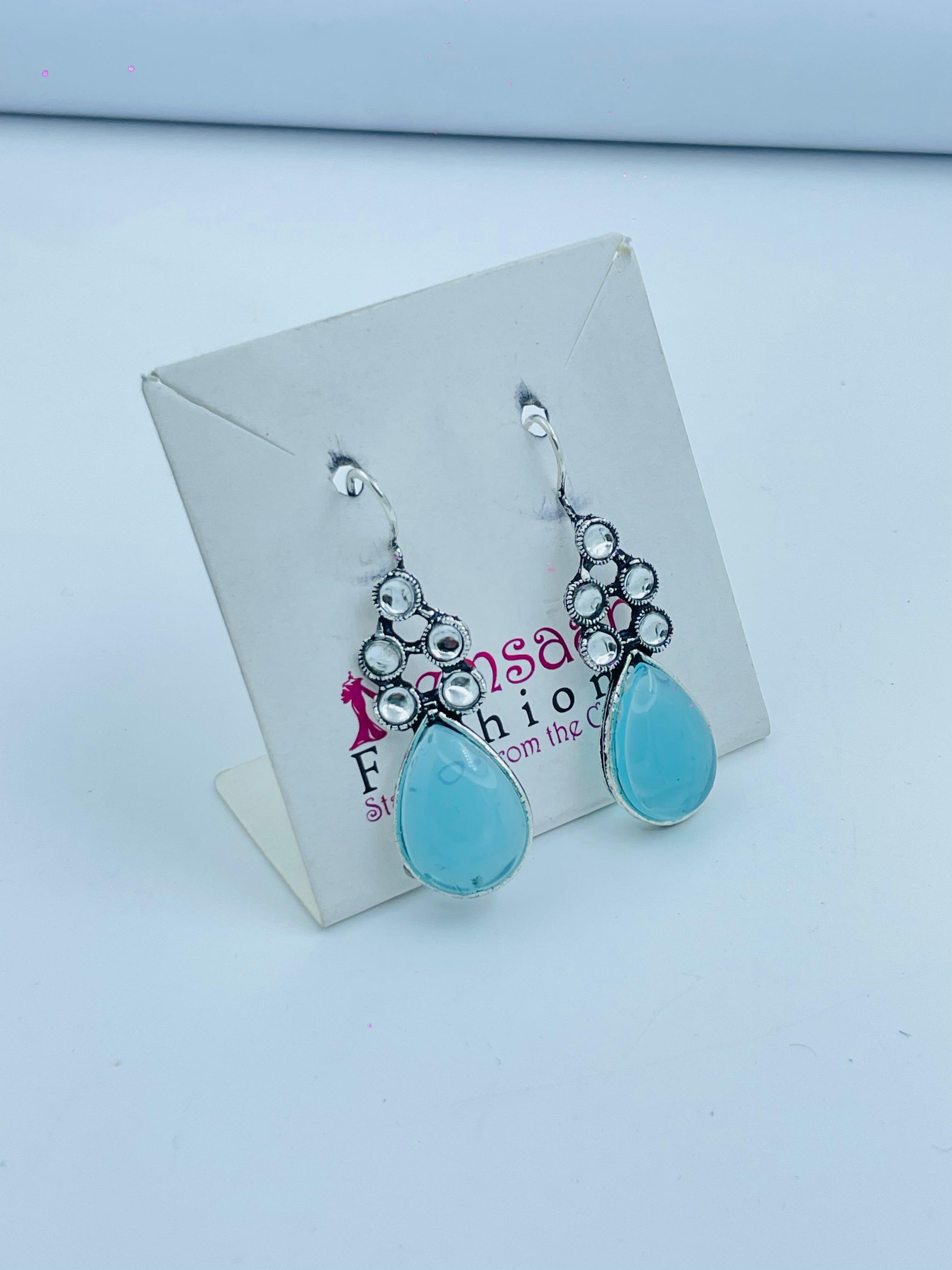 Elegant Light Blue Teardrop Earrings with Silver Detailing