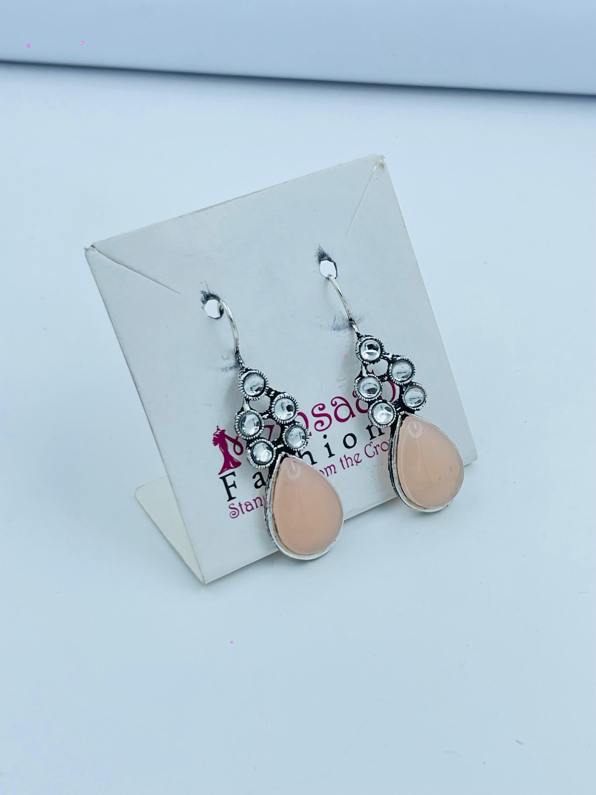 Charming Peach Teardrop Earrings with Silver Details