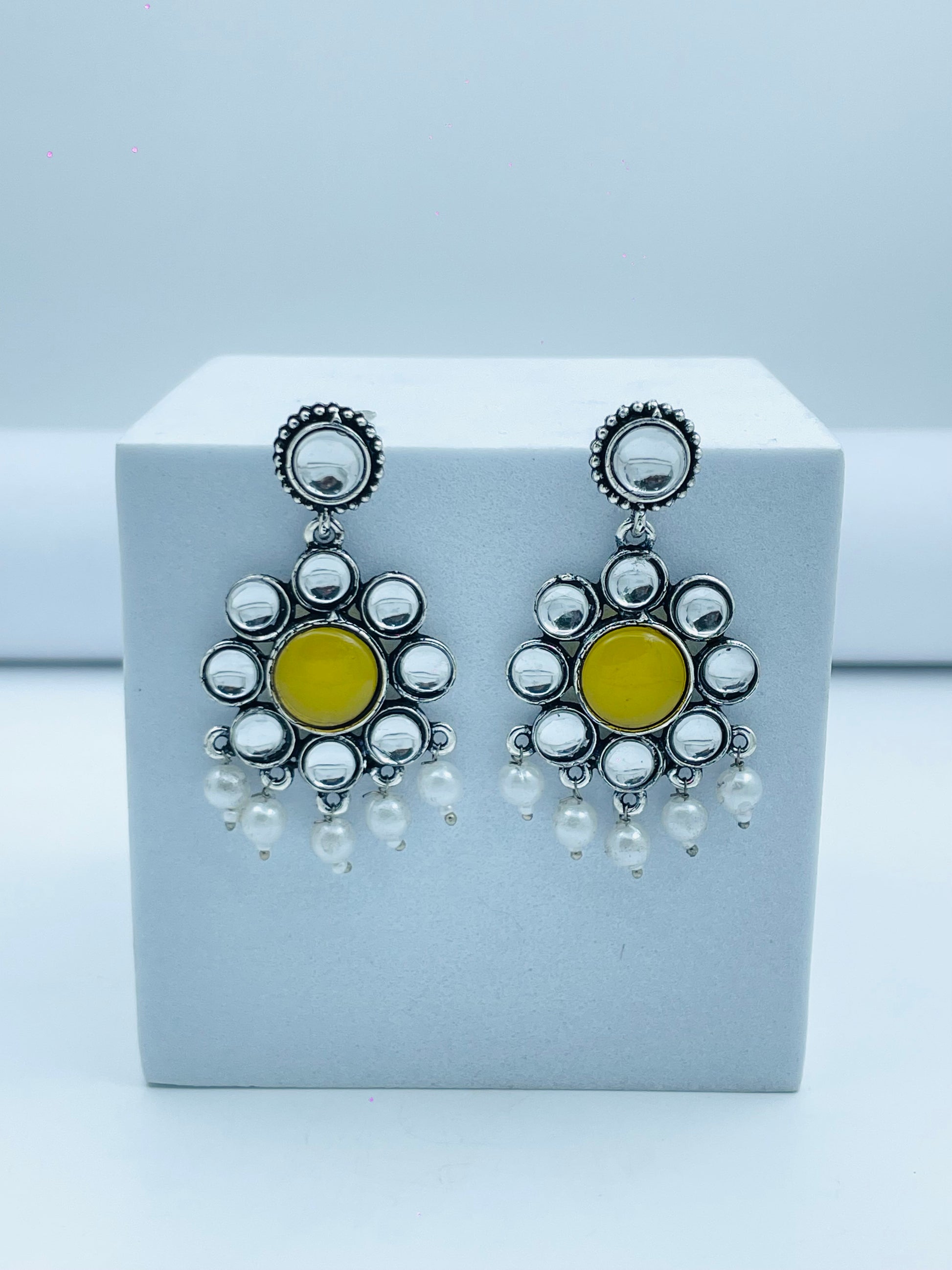 Round Silver Pom Pom Earrings with Yellow Stone