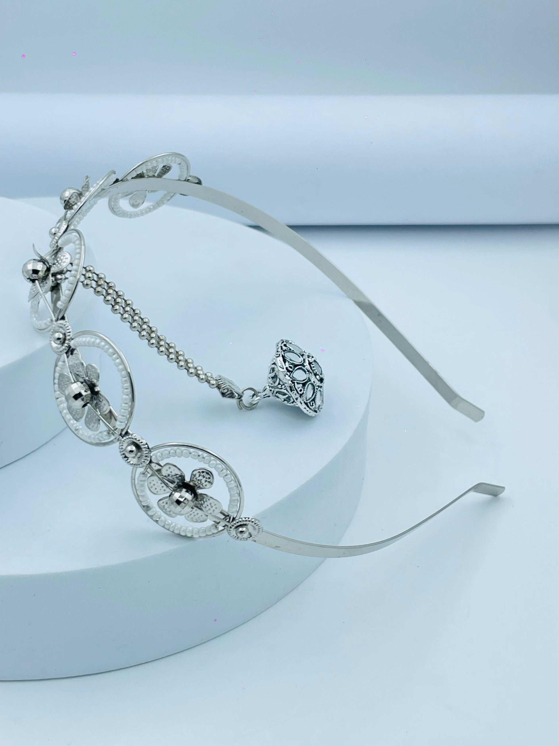 Elegant Silver Filigree Tiara with Intricate Design