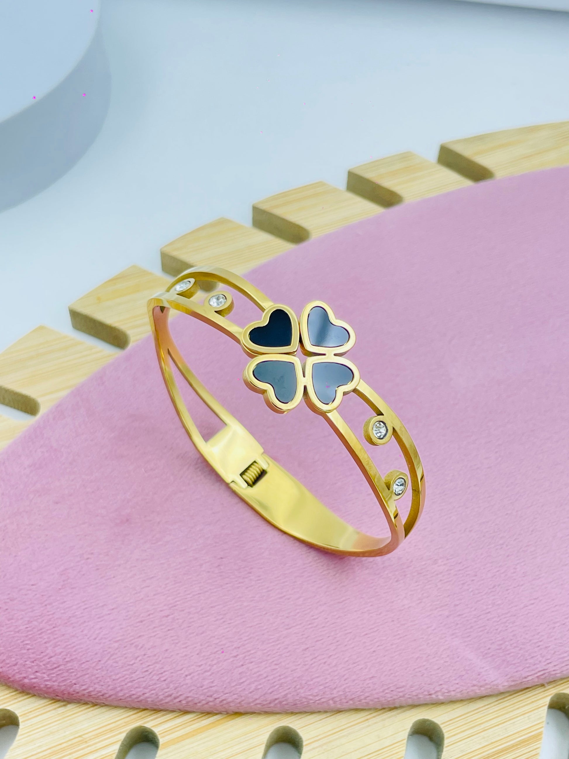 Elegant Gold Clover Charm Bracelet with Gem Accents