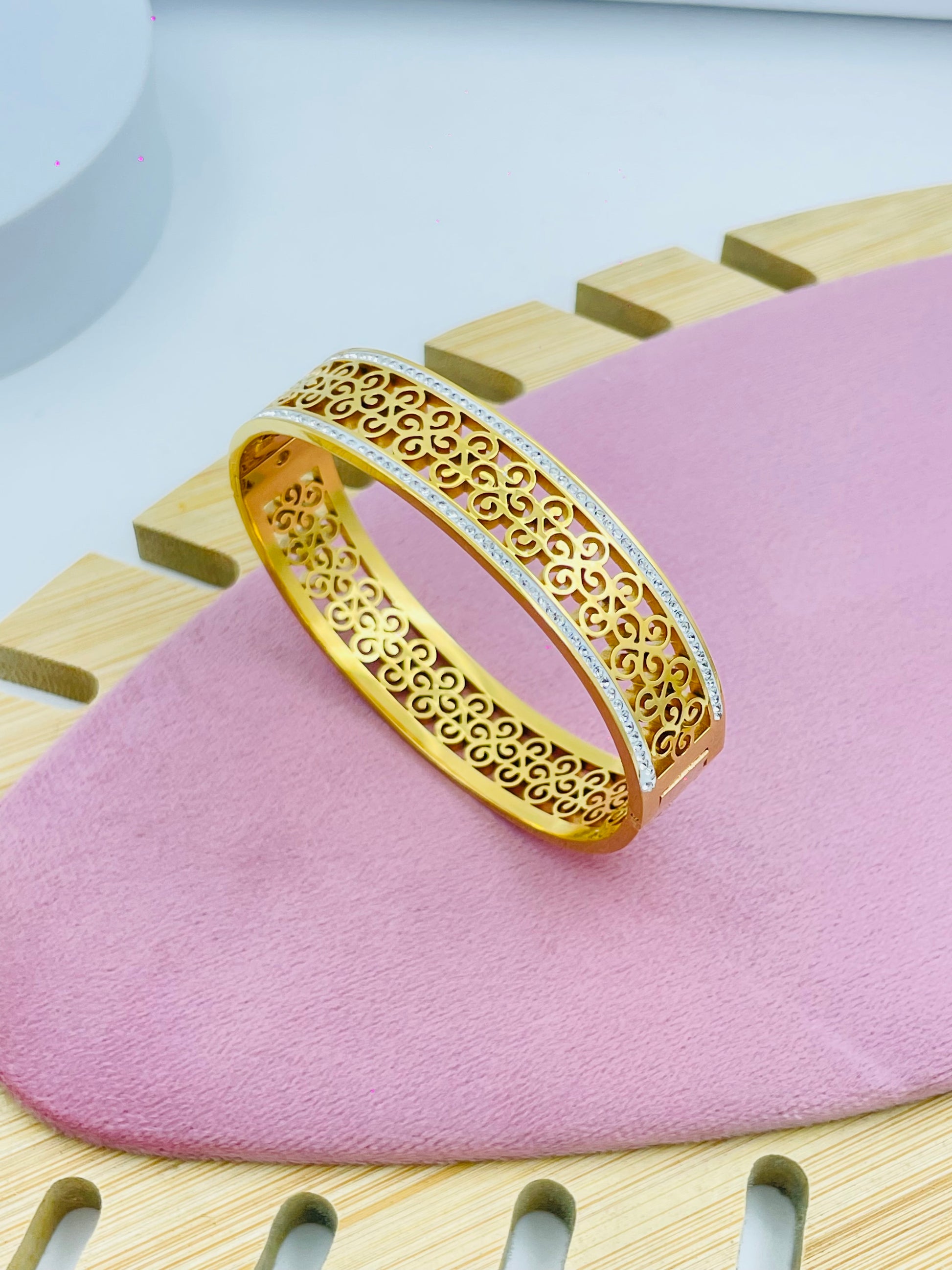 Elegant Gold Filigree Bangle with Silver Accent