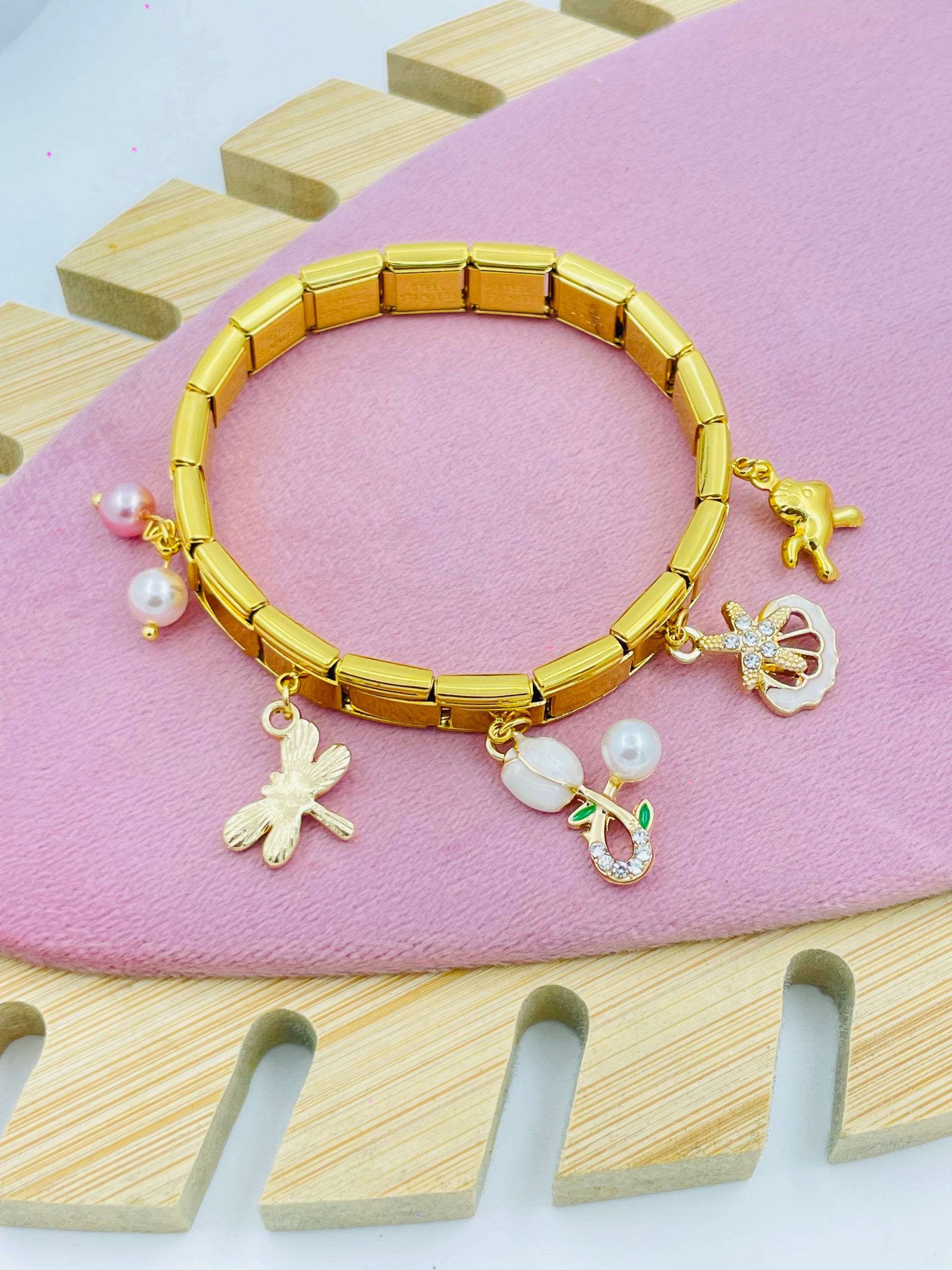 Elegant Gold Charm Bracelet with Pendants